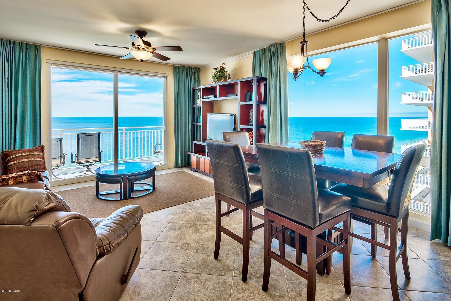 Phenomenal opportunity to own a 3-bedroom corner unit with one of the most desirable floor plans at Splash! This is the ''Paradise'' floor plan totaling 1,702 square feet with two Gulf front master bedrooms, 3 private balconies, 3-bathrooms and a separate lockout suite complete with a kitchenette! This unit has been beautifully updated with new 20'' tile floors throughout, added crown molding, window tinting, new fans and high-end decor featuring flat screen TVs in each room. The HVAC system was also installed June 2014 and is a Coastal Green Air System which saves on energy bills. Interior also features raised ceilings, on open floor plan and large sliding glass doors enhancing the Gulf views. The kitchen has granite countertops & breakfast bar, ample cabinets and a tile backsplash. Enjoy Gulf views from the kitchen, dining & living area and relax in luxury. There are two Gulf front master bedrooms with private balconies, tile floors and crown molding. One features a king bed, walk-in closet and en-suite bathroom with granite countertops, double vanities, garden tub and separate walk-in shower. The second master suite offers a queen bed and en-suite bathroom with pedestal sink and shower/tub combo. There is an additional guest quarters which is a unique feature as it has its own lockout entry, which is perfect for privacy and rentals. This room has a built in kitchenette with a mini-fridge, granite countertop and dining area. There is an en-suite bathroom with granite and shower/tub and a private balcony with Gulf views. The unit is being sold fully furnished & decorated and there is a stackable washer & dryer included. This is the perfect full-time residence, second home or vacation rental. It is currently being rented by the owner and has great rental income. 

Splash Resort is a one-stop destination with luxurious amenities to cater to your every need. The resort is very family friendly with an expansive covered water park filled with multiple pools, a playground, water slides, fountains, splash areas and interactive toys including a bucket that fills with water. There is a Gulf front pool, sun deck, hot tub and lazy river not to mention a poolside bar & grill and shave ice for convenience. Splash has a designated boardwalk to the beach and seasonal beach rentals. Enjoy the Gulf front exercise room with state of the art equipment, indoor arcade, lounge area, and covered skyway from the parking garage. The resort is located on the desirable West end of Panama City Beach close to upscale communities like Rosemary & Alys Beach and also not far from Pier Park in Panama City Beach. Do not miss out on this incredible opportunity!