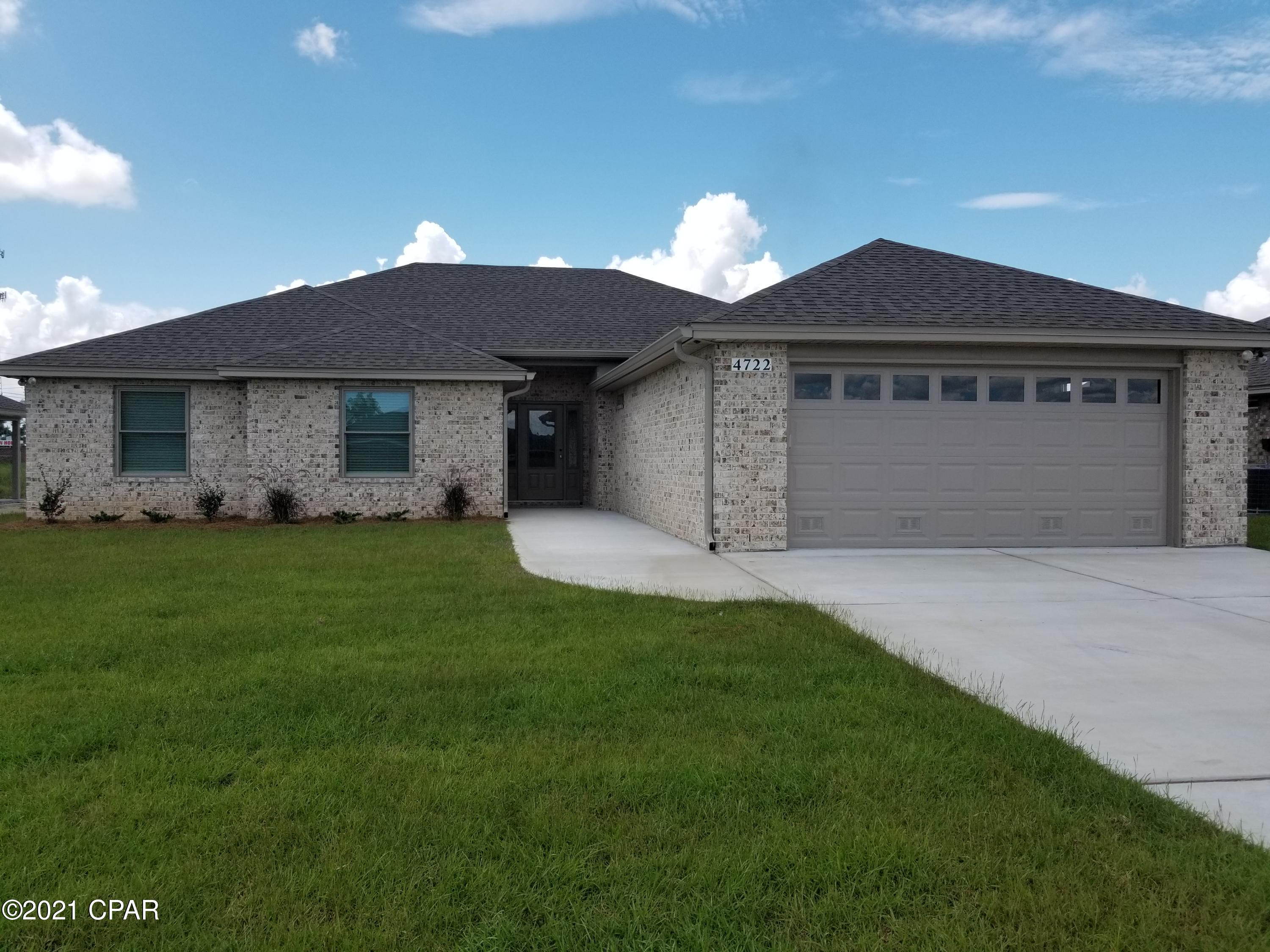 Open Today 10am-3pm. Need a large home well this 3 bedroom 2.5 bath 2 car garage with man cave added all brick home that offers large open floor plan. Master bath with his & hers double shower with Rain maker (3 shower heads) and shower seat, double vanity, large master bedroom with built-in rope lighting and large walk-in closet. The kitchen is a dream with all real wood cabinets, granite countertops, sink in island, stainless steel appliances. There are cabinets in the laundry room. Living room with high ceilings, electric fire place, crown molding and wired for entertainment. Home comes with large Florida room, front porch, both covered and open back porch, security system, thermseal spry foam system and generator ready electrical outlet with cord. outside shower and sprinkler system