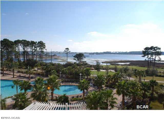 Spectacular views from this 6th floor condo in Reflections at Bay Point. This is a 2 bedroom / 2 bathroom unfurnished condo available in May. Watch all the boat traffic going from the Lagoon through the pass and out to the Gulf. Enclosed balcony also overlooks the Nicklaus Golf Course at Bay Point and the resort style pool. Open kitchen/dining/living area is completely tiled. Split bedroom floorplan with master overlooking the lagoon/pass/gulf. Master bath features dual vanities, separate garden tub and walk-in glass shower. Washer/dryer hookups in the condo. Please note: Pictures are of a similar unit. Actual unit is unfurnished and two floors higher. Pets are not allowed.