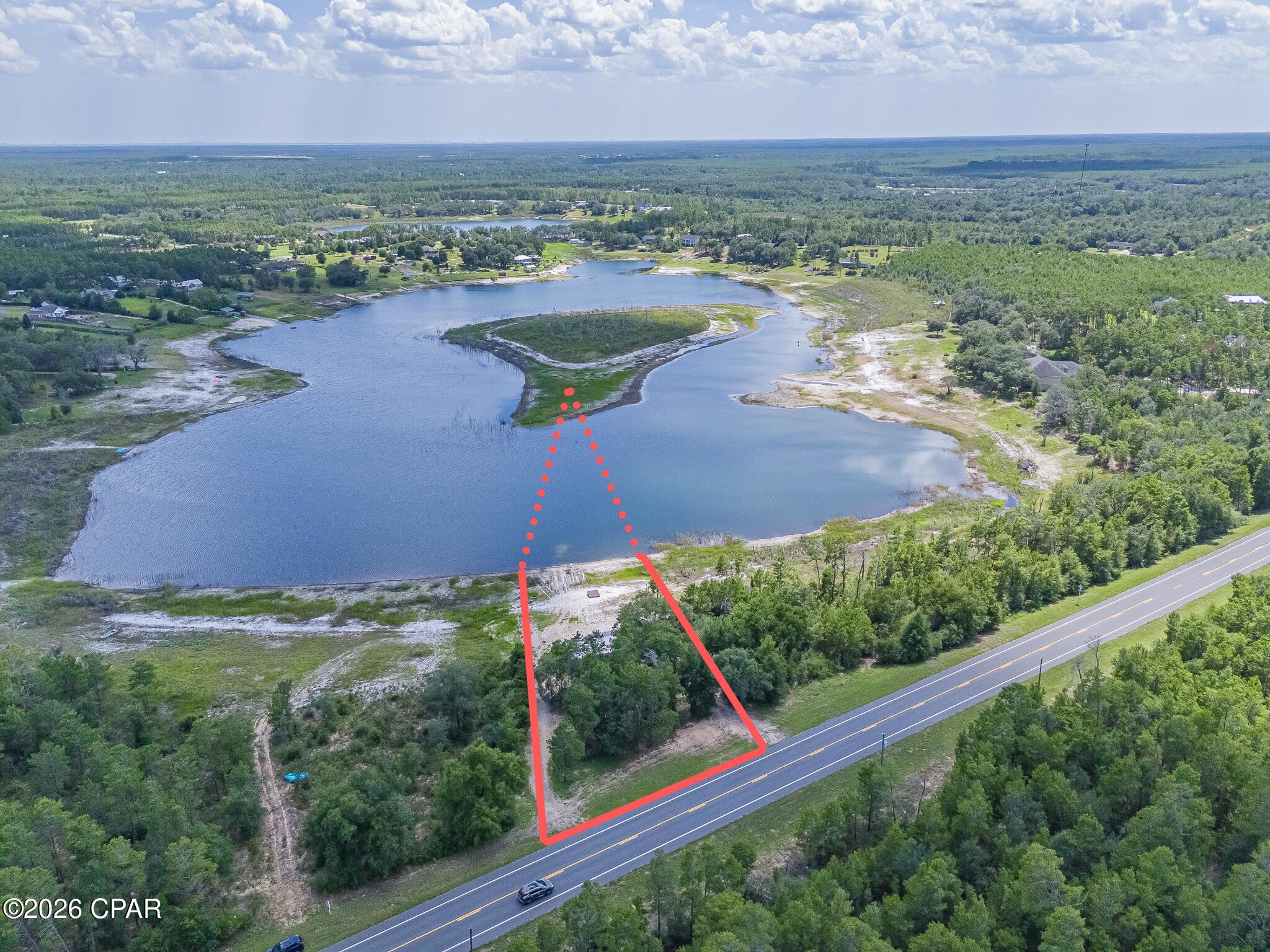 Discover the perfect opportunity to own 1.78 acres of beautiful lakefront property offering privacy, recreation, and endless possibilities. This exceptional property features a unique three-tiered layout with two gated entrances, providing ample space to build your dream lakefront home while creating separate areas for entertaining, recreation, and enjoying the outdoors. Enjoy direct access to the lake for fishing, boating, kayaking, canoeing, paddle boarding, swimming, or simply relaxing while taking in the peaceful waterfront views. Existing improvements include a large pole barn, an additional storage shed, electric service, water, and a temporary septic system, making the property ready for immediate enjoyment or future development. Whether you're looking for a private weekend retreat, a place to create lasting family memories, or the perfect location to build your custom waterfront home, this one-of-a-kind property offers the ideal combination of natural beauty, convenience, and unlimited potential.