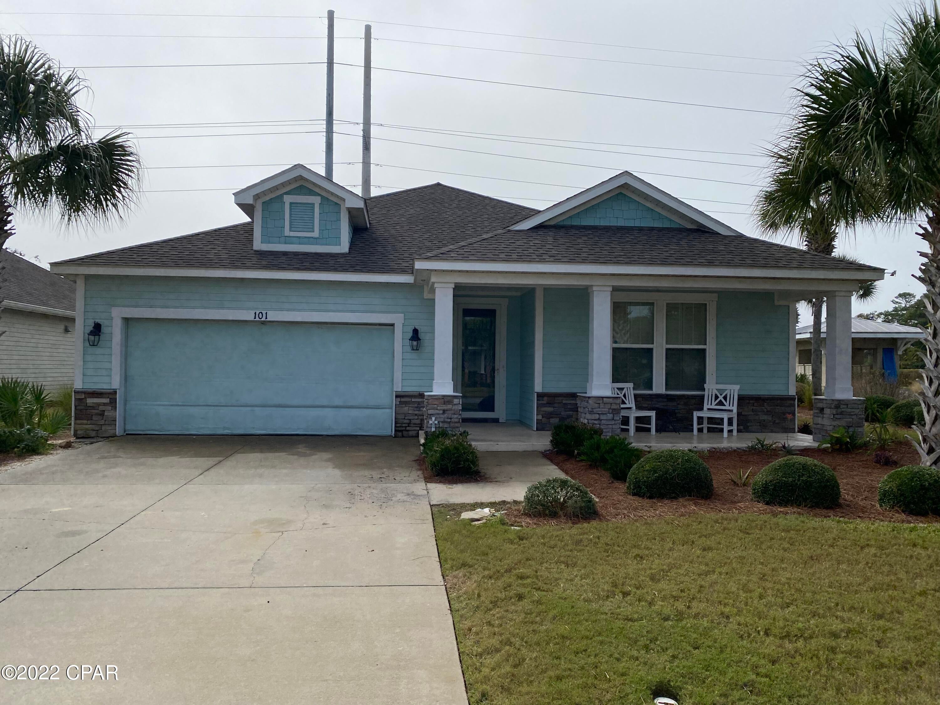 Investor alert!  Craftsman style former model home on oversized lot located on the West End of Panama City Beach in Whisper Dunes.  This home will require some minor cosmetic repairs and is sold as is. Perfect opportunity for homeowner to build in sweat equity.  4 minute golf cart ride to beach.    Close to 30A, Pier Park, shopping, entertainment and restaurants!  Community Pool and Pavilion. HOA maintains your lawn. NOT SHORT TERM ALLOWED.