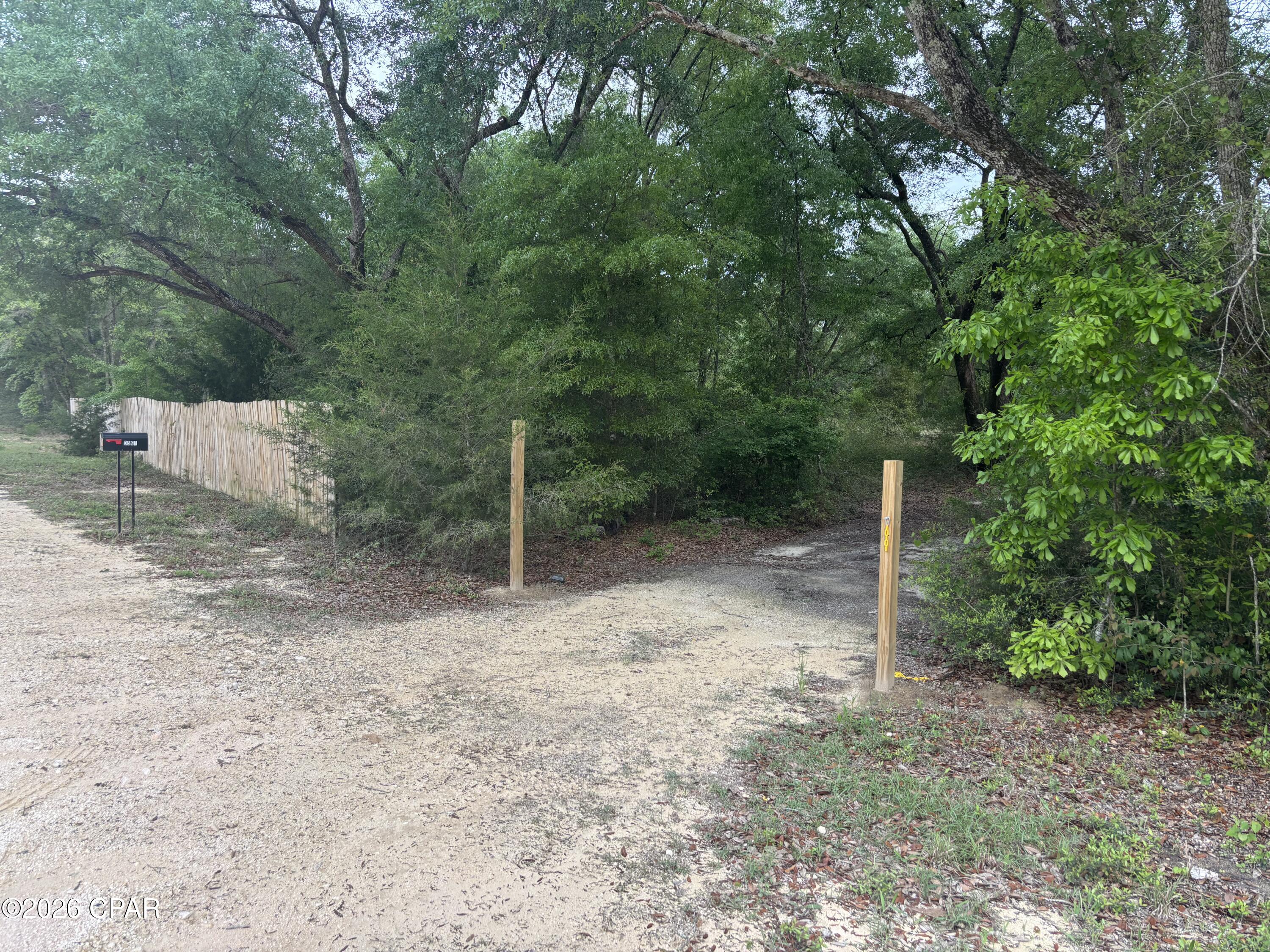 Build your dream getaway on this 1.13-acre homesite in the desirable Compass Lake Hills community. A power pole with electricity and deep well are already on site. Offering a peaceful rural setting, this property provides flexibility for a future homesite, weekend retreat, or investment opportunity. The lot features 168 feet of frontage by 295 feet deep, with dirt, maintained road access and septic needed. Conveniently located in Jackson County, this property combines privacy, space, and the charm of North Florida living.
Recently improved and ready for its next owner, this parcel offers an affordable chance to own land in a quiet area with room to spread out. Voluntary POA for access to Compass Hills recreational facilities. Whether you're planning to build now or hold for the future, 3561 Elm Rd delivers the space and setting to make it happen.