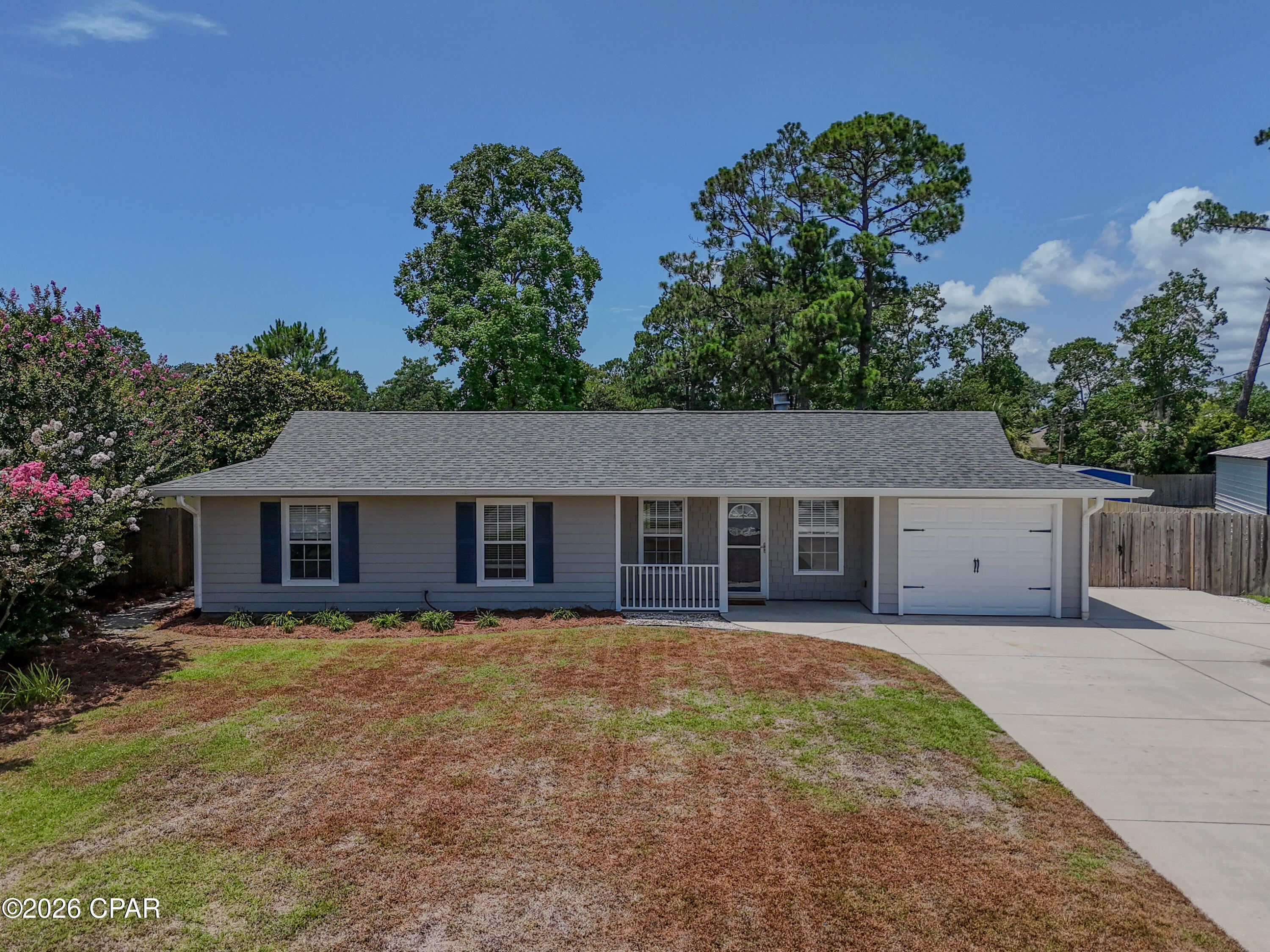 This adorable ranch style 3-bedroom, 2-bathroom house in a prime location of the west end of Panama City Beach is a can't miss. The wrap around screened in porch that offers a view of the large yard makes this home perfect for hosting or watching a serene yard with your morning coffee. The driveway can fit up to 6 small cars! The owner does allow boat or trailer parking! 

Rent includes: lawn care and pest control. This makes for the utmost convenience. Pets negotiable.