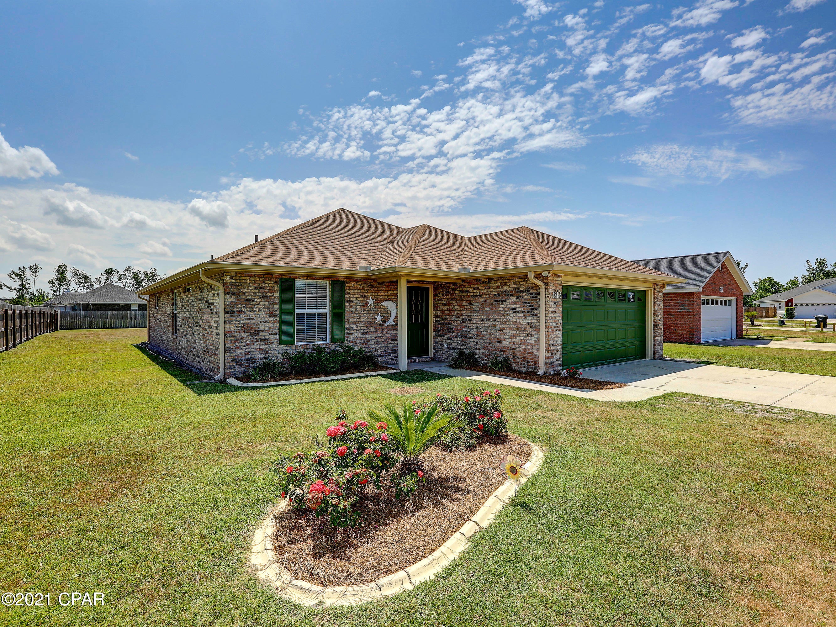 WELL BUILT, LOVINGLY MANICURED BRICK HOME IN QUIET LYNN HAVEN SUBDIVISION, LOCATED IN A GREAT SCHOOL DISTRICT! Beautifully remodeled, this home is like new! Improvements include ALL NEW: vinyl plank flooring throughout, paint, range, microwave, refrigerator, dishwasher, garbage disposal, screened back porch, water heater, garage door opener, soffits, gutters, windows on the North wall, attic insulation, HVAC and, like everyone else in Bay County, a new roof!!  The fireplace no longer burns wood. It has been capped off and could easily have an elec fireplace insert installed. The MBR has plenty of room for a king bed. The MBA has a sep shower, whirlpool tub and 2 walk-in closets. The 2nd bedroom has a tray ceiling and would make a nice office. Kit has granite counters and lots of space for food prep. There is a breakfast bar and the dining area has lots of natural light! From there, you can access your screened-in back porch and enjoy the evening breezes!  Spacious backyard could easily hold a pool and there is extra patio area for grilling! Age, room sizes, lot size and sq ft are estimates. Please measure if concerned.