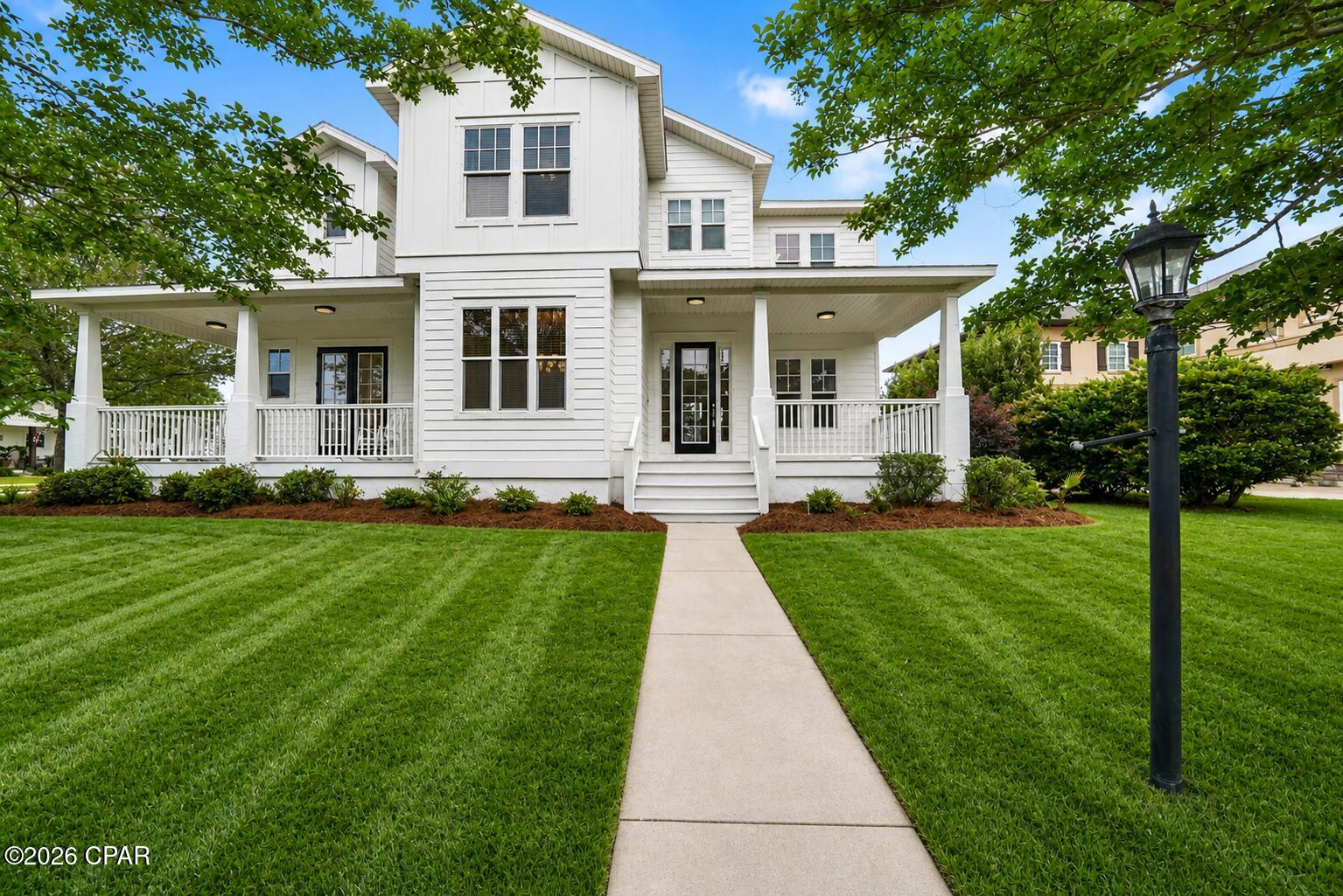**READY FOR ITS NEXT OWNER!** Welcome to 300 Coconut Grove Court, an exceptional opportunity in highly desirable Tapestry Park offering approximately 3,700 square feet, 5 bedrooms, 3.5 bathrooms, two primary suites, a dedicated office, multiple living and dining spaces, and one of the best values currently available in the community at **$749,000**.

This beautifully updated home offers a flexible layout designed for both everyday living and entertaining. The main-level primary suite features private porch access, while the oversized upstairs primary retreat includes a sitting area and private deck. Additional highlights include fresh interior and exterior paint, luxury vinyl plank flooring, updated lighting, refinished cabinetry, quartz countertops, Whirlpool stainless appliances, and a custom wet bar with built-in ice maker.

Situated on a premium corner lot, the large fenced backyard provides ample room for a future pool, outdoor kitchen, boat, golf cart, jet skis, trailers, or simply additional outdoor living space. The oversized double-gate access makes storing recreational equipment easy.

Tapestry Park residents enjoy access to a clubhouse, community pool, tennis, pickleball, basketball, playground, green spaces, and a golf-cart-friendly setting, all just minutes from the beach, dining, shopping, schools, and everything Panama City Beach has to offer.

If you thought you missed your chance at this one, here it is. **300 Coconut Grove Court is back and priced to move at $749,000.**