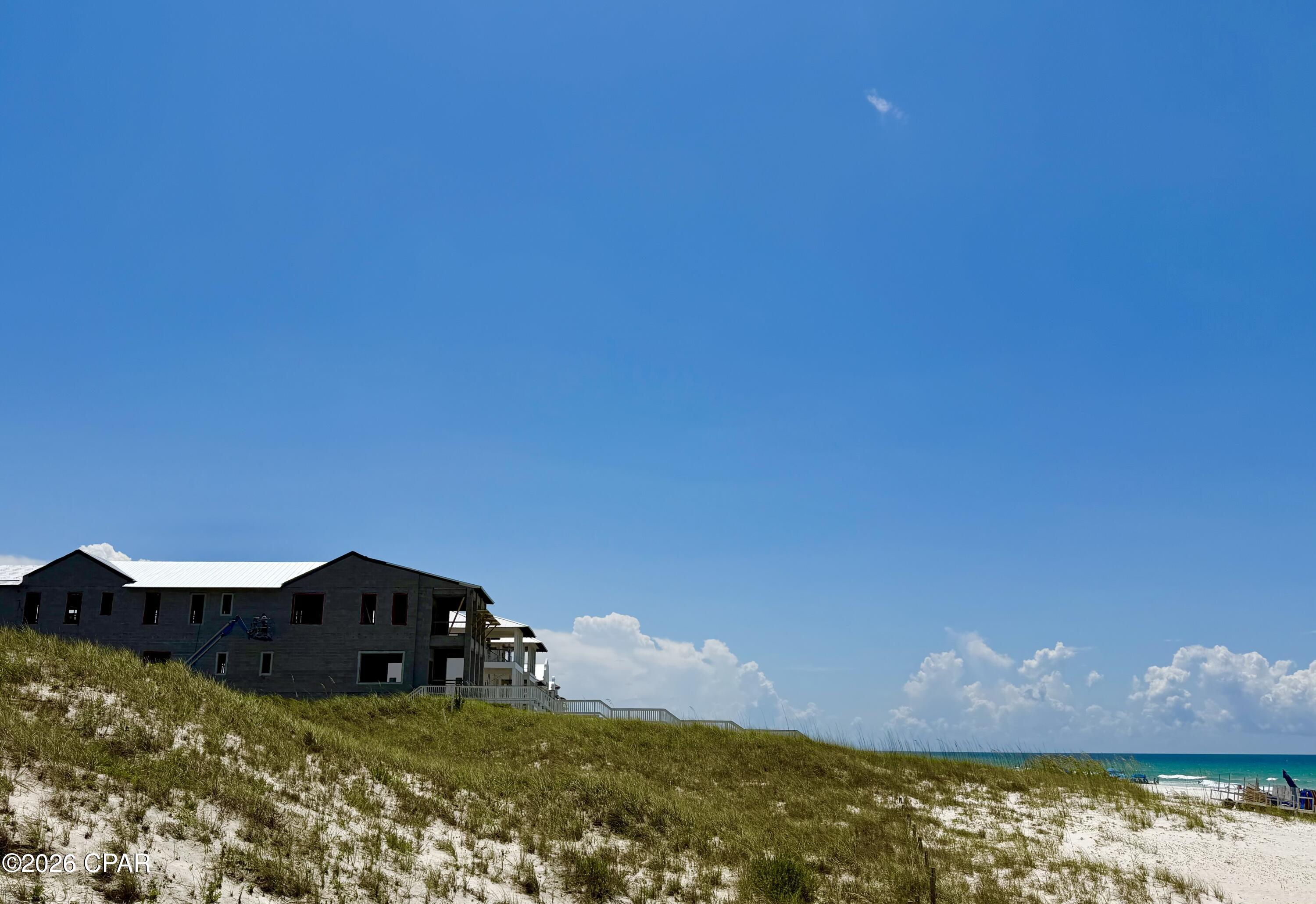 Lot 1 has 49 linear feet on the Gulf of Mexico and is approximately 567.5 deep. Lot to be sold by metes and bounds. This is an exceptionally deep lot and will be allowed to have a house and guest/carriage house larger and taller than similar Carillon Beach lots (62' tall instead of 55' from sea level for main house roof peak). This lot is a great opportunity to build your dream beach home with spectacular views of the Gulf of Mexico and Lake Powell.