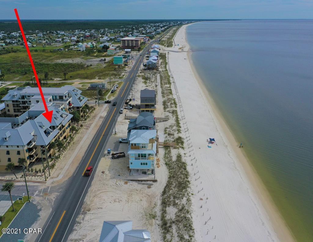Premium 3BR/2BA condo in The Club finally on the market. This condo overlooks the beach and is on the 4th floor including parking which gives great elevated views of Mexico Beach. Gorgeous finishes and decorations throughout the home with a popular layout. Big open living/dining/kitchen that opens up to a mostly covered deck that has some uncovered area for enjoying the sun. Tastefully decorated, higher end appliances and sold mostly furnished/equipped, not your standard condo by any means. Great rental potential grossing $43K from May-Oct of 21. Check out the virtual tour and you won't be disappointed.