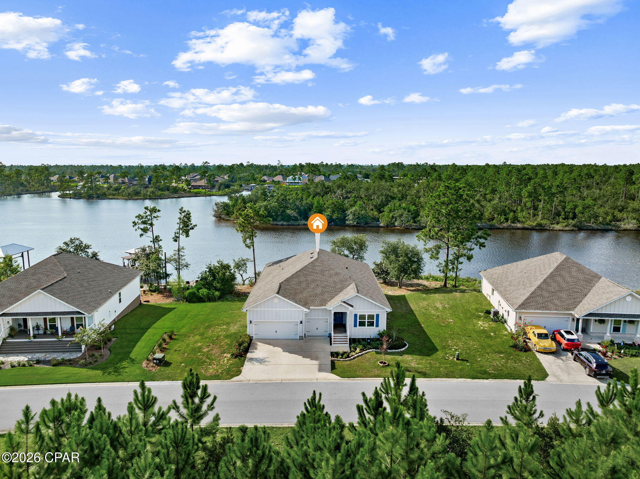 EXTRAORDINARY 1.99% ASSUMABLE VA LOAN available to qualified buyers, subject to lender approval. 

Welcome to 325 Confidence Way, where peaceful bayou living meets Gulf-access adventure. Positioned directly on the water in the desirable Fanning Bayou community, this exceptional home offers boating access to the Gulf, Shell Island and Gulf Intracoastal Waterway destinations, including Crab Island.

Enjoy wide water views from the main living areas, primary suite and expansive screened porch. Envision building your own private dock and creating the waterfront lifestyle you have always wanted.  Across the street, a recorded conservation easement requires the land to be maintained forever predominantly in its natural condition and prohibits buildings and other structures, providing a protected natural buffer.

Inside, the bright, open-concept design is filled with natural light and thoughtfully arranged for everyday living and entertaining. Updated lighting fixtures throughout add a stylish, contemporary touch. The spacious gathering room features a tray ceiling, recessed lighting and picturesque bayou views. The adjoining dining area flows into a well-appointed kitchen featuring an oversized granite island, abundant cabinetry, stainless steel appliances, double ovens, range hood and walk-in pantry.

The waterfront primary suite offers a peaceful retreat with a tray ceiling and beautiful bayou views. The spacious bath features dual vanities, a soaking tub, and a separate shower while the walk in closet includes a custom organization system. Custom-designed closet organization systems are found throughout the home, offering abundant built-in shelving, hanging space and storage.

Step outside to the screened waterfront porch and enjoy morning coffee, evening sunsets and the ever-changing bayou scenery. The spacious three car garage offers ample parking along with built in storage for boating equipment and recreational gear. The roof was replaced in 2023 with GAF Timberline HDZ shingles and GAF WeatherWatch underlayment, adding another valuable improvement.

Community amenities include a resort-style pool, hot tub, covered gathering pavilion and playground. With its direct bayou frontage, exceptional boating access, protected natural surroundings, spacious open layout and remarkably low assumable interest rate, 325 Confidence Way presents a rare opportunity to enjoy the best of Northwest Florida waterfront living.