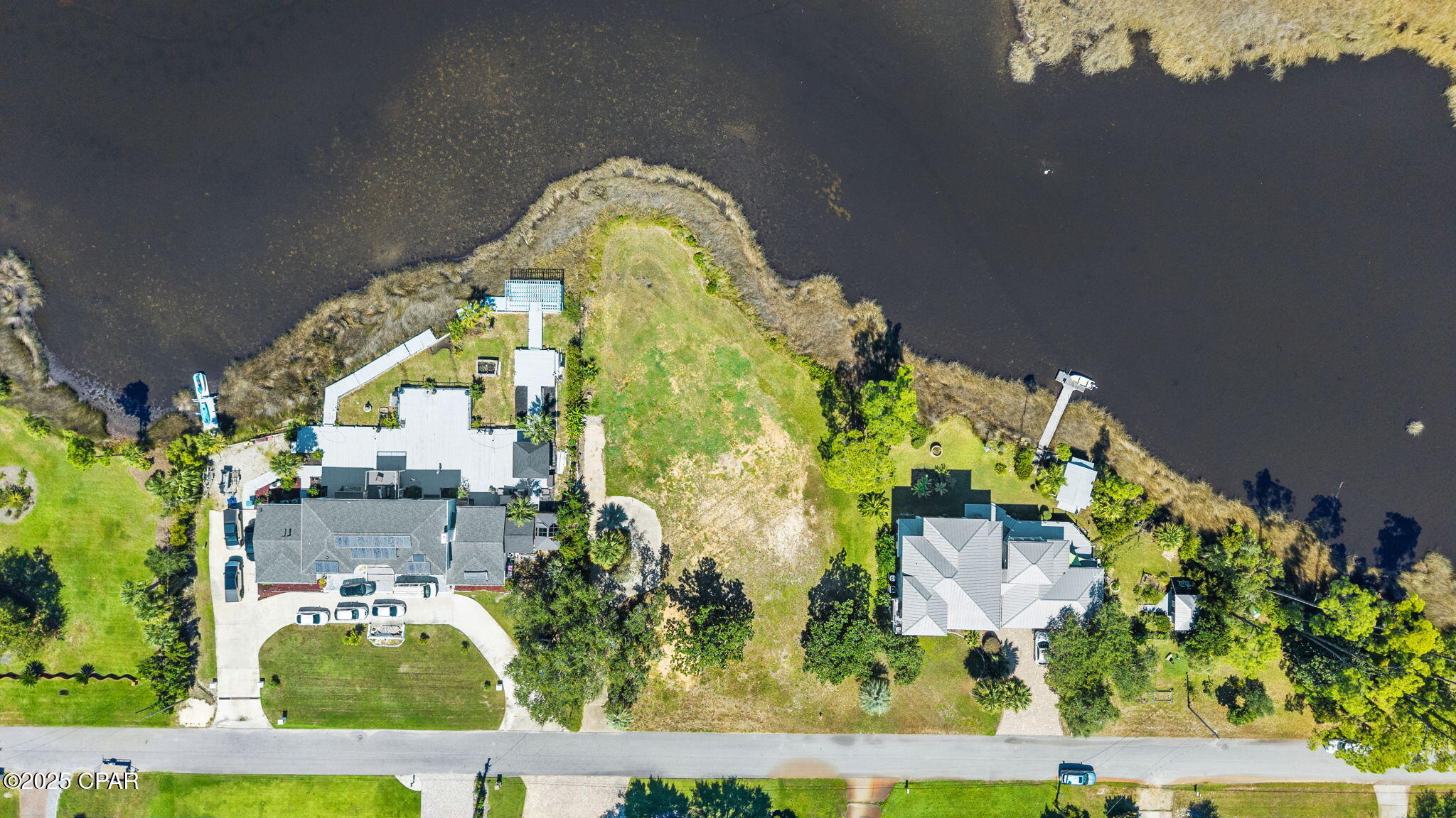 Build your own dream retirement or second home on this beautiful waterfront lot. Sunset views make this lot a preferred choice for a homesite. It offers stunning views stretching across the bayou to North Bay.  Located in a well established neighborhood with close proximity to hospitals, schools, grocery stores, coffee shops and fast food. 
135' of waterfront and .60 of an acre.
Recent survey is available for review.