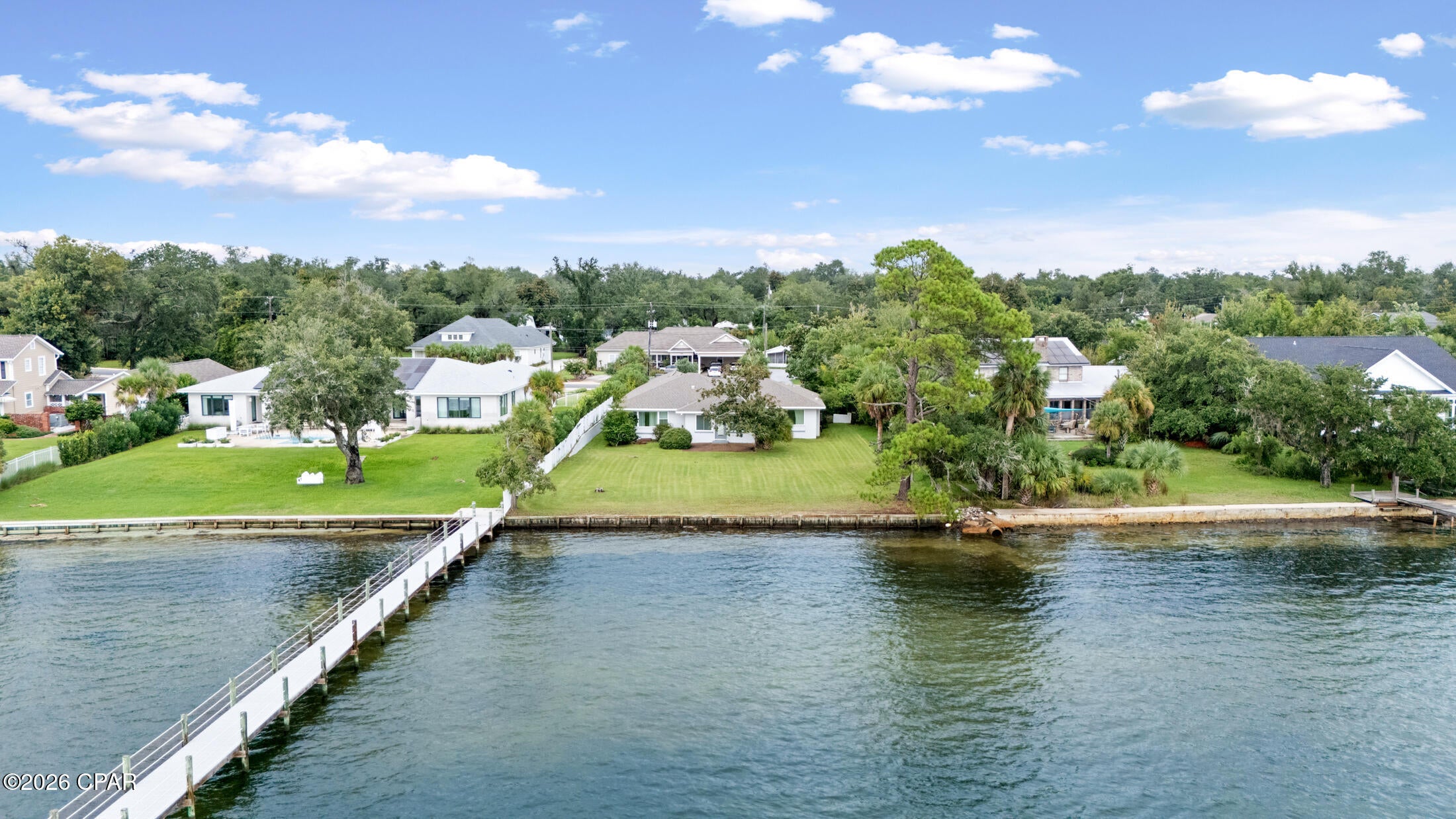 CURRENTLY UNDER CONTRACT- SELLER WILL CONSIDER BACKUP OFFERS

Experience waterfront living at its finest in one of Panama City's most sought-after neighborhoods. Nestled in tranquil Bunkers Cove, this beautifully maintained 3-bedroom, 3-bath home offers breathtaking bay views, direct waterfront access, and endless opportunities to enjoy the coastal lifestyle.

Thoughtfully remodeled in 2020, the home blends modern updates with timeless waterfront charm. A 2019 roof provides added peace of mind, and the HVAC system was professionally serviced on July 21, 2026, making this home move-in ready. Spacious living areas are designed to maximize the stunning water views, creating the perfect setting for relaxing evenings or entertaining family and friends.

Conveniently located just minutes from downtown Panama City, hospitals, shopping, dining, and a short drive to the World's Most Beautiful Beaches, this property offers the perfect balance of peaceful bayfront living and everyday convenience.