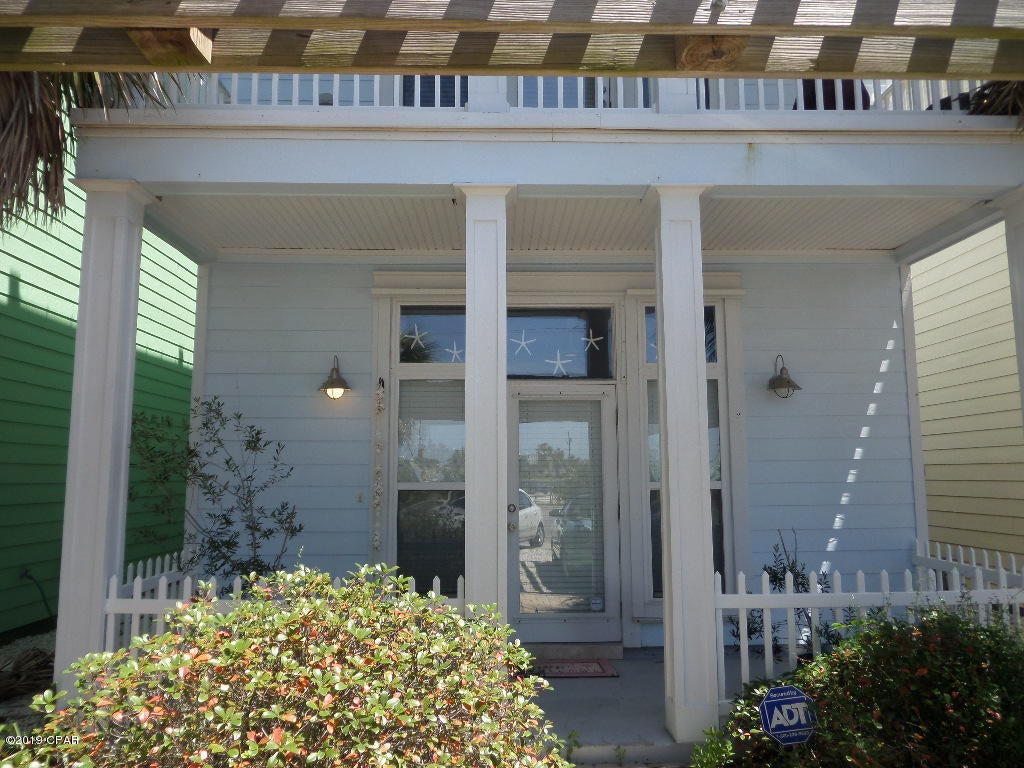 Beautiful three story beach home with private pool. This 3 bedroom, 3.5 bath home is directly across from Rick Seltzer Park, with a gulf waterview from the third floor balcony & open deck. Island kitchen with granite countertops. Tile flooring, pantry, and kitchen is equipped with all appliances. ''WIFI'' smart home capabilities with lighting, some of the appliances, thermostat. Living/dining combo features gas fireplace and wine bar. Master bedroom has walk-in closet, built in desk and private balcony. Master bath features separate shower and has whirlpool garden tub. Bonus room on 3rd floor ideal for family room or entertaining.  Pool service included. Much more to see. Call today for preview.