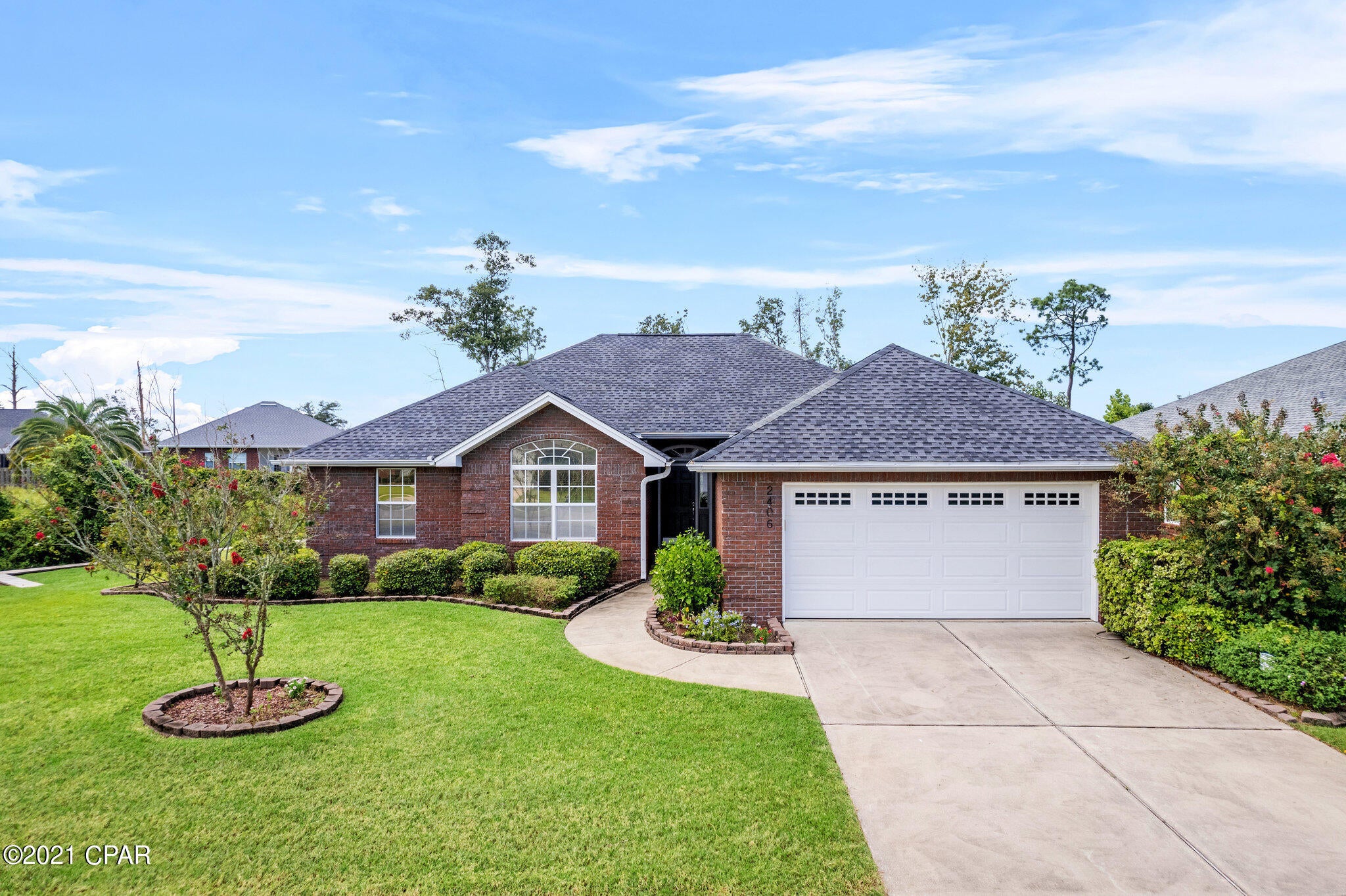 BACK ON THE MARKET! Buyers financing fell through!-- Check out this well-maintained home located in the desirable Camryn's Crossing subdivision! This home has a spacious 3/2 floorplan with split concept on an end lot. The home features pristine hardwood floors throughout the living area, dining room and hallways. Updated appliances in the kitchen including gas stove and brand new range hood. The kitchen also offers an abundance of oak cabinets, pull-out shelves and granite countertops. Master suite has a large walk-in closet with his & her vanity in the master bath including garden tub and separate shower. Other features of this home are tankless water heater, 2 car garage and brand new retaining wall along the property. Sellers just added a brand new HVAC unit 09/2021.