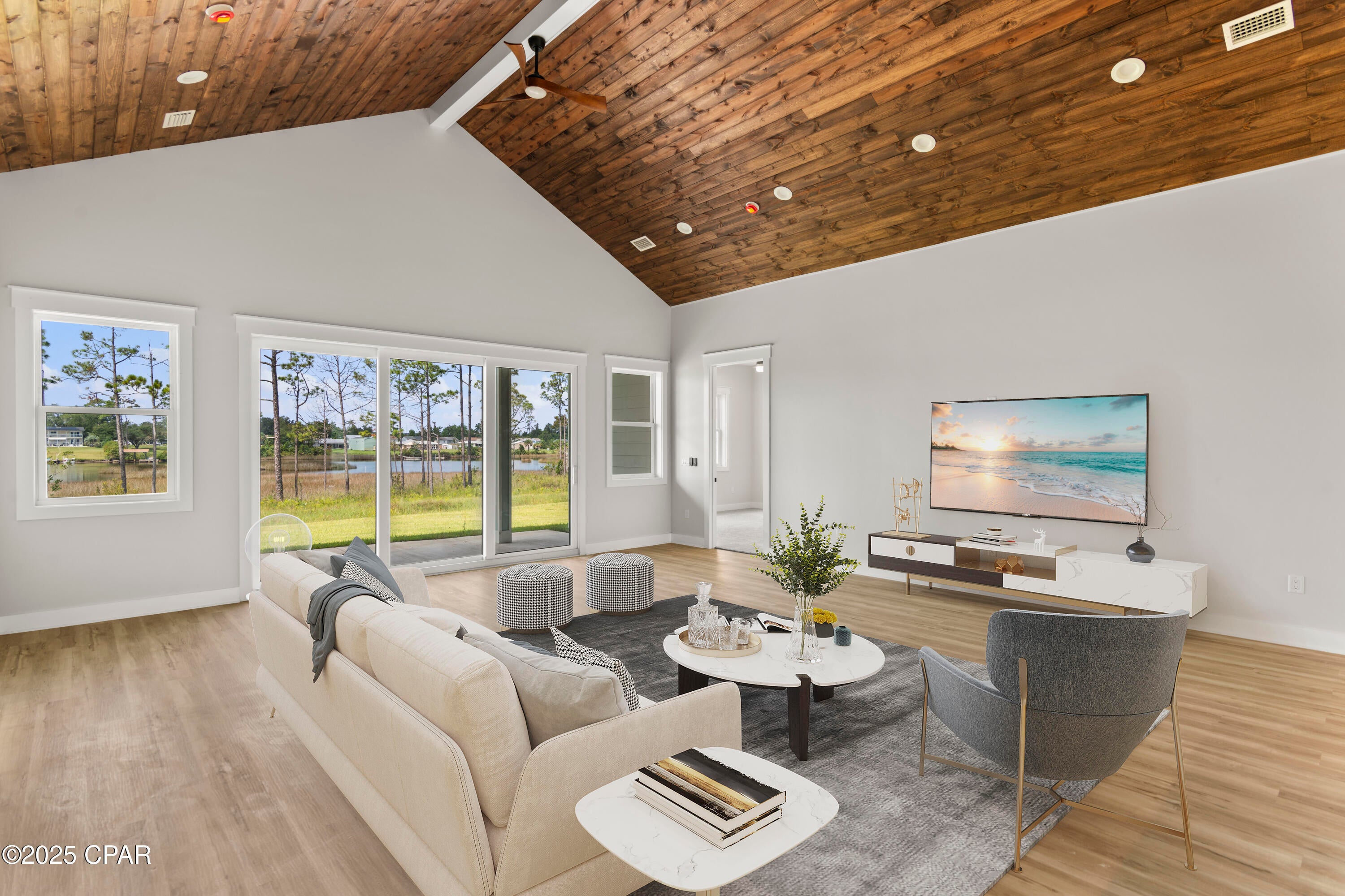 NOW PRICED BELOW APPRAISED VALUE! **Construction Complete** 1% lender credit with preferred lender to buy down rate or prepaids and closing costs! Discover your dream home located on Callaway Bayou just miles from the charm of Historic St. Andrews and downtown Panama City known for its quaint shops, dining & entertainment. This beautifully crafted NEW construction waterfront property, offers the perfect blend of modern living and tranquil waterfront beauty on nearly a half acre lot. NO HOA & NO FLOOD INSURANCE REQUIRED! Prime location near Tyndall AFB. Notable features include 2x6 construction, spray foam insulation, 5 ton HVAC, hurricane impact windows, and fortified roof.