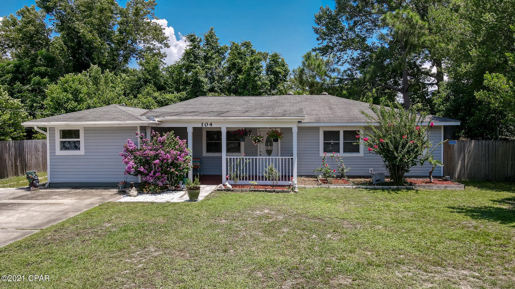 NEW ROOF! Large 4-bedroom, 2.5 baths house on the west end of Panama City Beach, close to HWY-79 and Pier Park. Home sits on a 0.3 Acre lot and offers 2-suites and an extra family room.  The tall commercial building on the corner blocks all the noise from HWY-98 and adds privacy to a peaceful and shaded backyard from a mature magnolia tree. All measurements are approximate. If important, buyer to verify.
