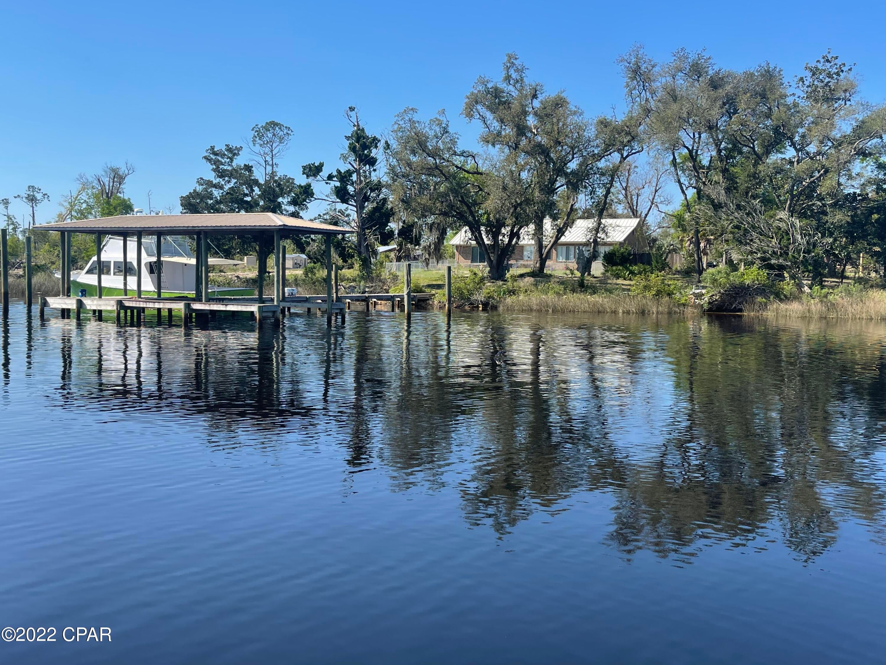 ''CURRENTLY UNDER CONTRACT, SELLER ACCEPTING BACKUP OFFERS'' Update! Seller has added Boathouse and water frontage to listing! Waterfront with Gulf access on The Fannin Bayou!! Approximately 183' of deep water! This Rare opportunity to own a property on Deepwater in the quiet community of Southport is a must see!

The Deep Water bayou stays 6-8 ft deep year round, and can handle all your  water toys.

The home has been completely remodeled with new custom kitchen cabinets, granite tops, and stainless appliances. The home has an open floor plan with a newer HVAC, New tankless water heater, new drywall throughout. You wont want to leave The breathtaking waterfront views  from the Dining area, Great room and Main Suite! This rare opportunity wont last long, call to make an appointment today!!