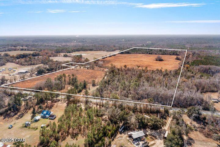 If farm living is the life you are looking for this is the perfect property for you!!!!!! This 109-acre parcel falls under agricultural zoning and is perfect for crops, livestock, dogs, cats and most any animals of your choice. There are several sites you can pick from for your new home or mobile home, workshop, pole barns or most anything you would like to build with proper permitting. There is a 1940 sweet farmhouse on the property that is great need of TLC before it can be occupied but would make such a cute place to call home or a guest house if needed. You will also find two nice size barns (one is a pole barn) and a smaller barn that needs TLC. This location is only minutes from Hwy 231, Interstate I10, Dothan Ala and a little over an hour from Panama City Beach. Two