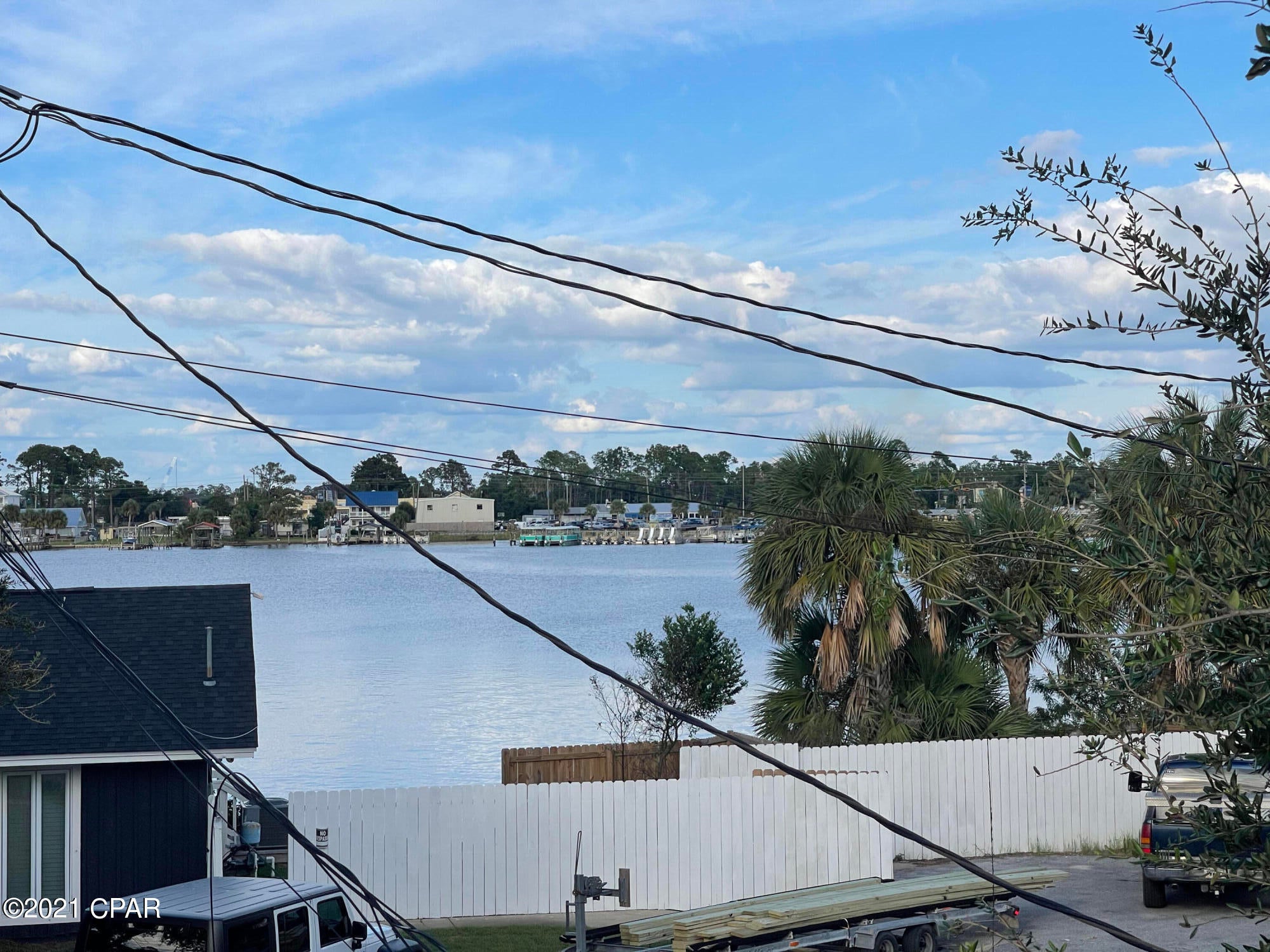 CURRENTLY UNDER CONTRACT, SELLER ACCEPTING BACKUP OFFERS



LOCATION! LOCATION! Turn key short term rental with bookings already in place! Two blocks to the Gulf of Mexico, a great view of Grand Lagoon and just  2 blocks away public boat ramp!  2 bedroom, 1 1/2 bath townhouse - completely remodeled in 2021.  LVP flooring throughout.  Tile in bathrooms.   Quartz countertops in kitchen.  Gorgeous view of the lagoon and the dolphins!  Completely furnished!  Great first time home or second home or investment property.  Short term rentals allowed. All booked rentals to transfer with sale. Hurry this won't last long! Rental Income - For the period of March 1 to December, 2021  totaled $30,094.00   The property was not rented during the months of September-November due to repairs being made and family/friends in town for vacation and holidays.  Owners used the property frequently for family and friends to stay in at no charge.  No rentals in Jan/Feb 2021, as owners were remodeling the kitchen and laying new flooring in the living room and entire upstairs.  

Prior to 2021, owners rents on a long term basis for $1800/month.

Currently, no flood insurance, but when they did have the cost was $412 per year.

Expenses:

Gulf Power - Monthly ave for the year is $178, 
Internet - $30/month with Wow
Water - for a year runs about $293, or average $48.83 every 2 months
Trash - paid quarterly $88.30

Owners are renting through Air BnB and I'm sure would transfer the account to new buyers.