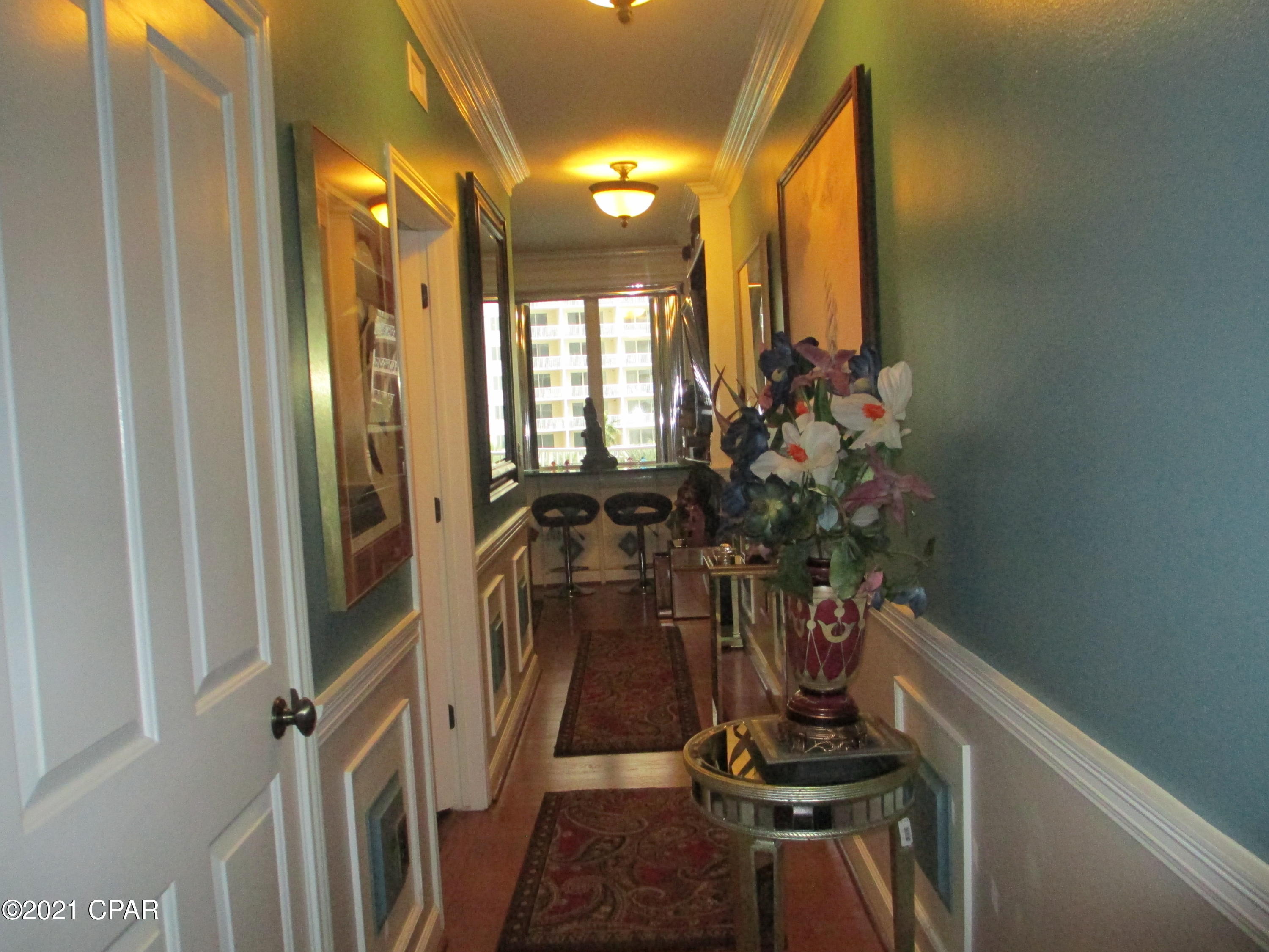 Gorgeous, One of a Kind Gulf Front 4th Floor Condo.  INCLUDES TWO SAME FLOOR   PRIVATE PARKING SPACES.  A parkng space sold for $35,000. Unit decorated with crown molding, name brand furniture, new sofa sleeper/love seat. $1500 living room silver blinds.  Electric fireplace, nice ART pictures etc.  Master king bedroom has 2 wardrobes.  The 2nd added small bedroom, bunks, door, window, wardrobe, office desk/chair, 32'' TV/Video Player.  Beautiful decorated kitchen has 2 pantries.  Furnished except China Cabinet with Owner Collectibles & other Personable Treasures.  Site amenities include 24 hour security, huge lagoon pool, fountains, outdoor hot tub, 2 Tiki bars,  tropical landscaping.  Indoor heated pool & hot tub. Fitness room with modern equipment.  Rental Ballroom for meetings/ weddings RING Front Door Audio, Video Surveillance Door Bell. 
 
PRICE FIRM.