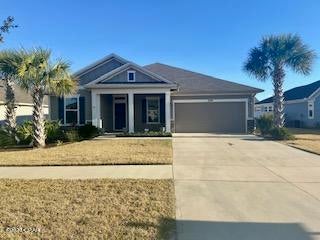 Beautiful home located in BREAKFAST POINT!!  4 bedrooms with a separate office! This home features a split bedroom floor plan and an open living area with plenty of space! Gorgeous kitchen with granite counter-tops, large island,stainless appliances, gas cook-top and large pantry! All living area has beautiful tile flooring with carpet in the bedrooms! Master with tray ceilings, master bath has a large walk in shower with glass surround , double vanity and large custom walk in closet. Large screened in back porch overlooking nice back yard with privacy Fence! Close to Navel Base, Pier Park and BEACH!!