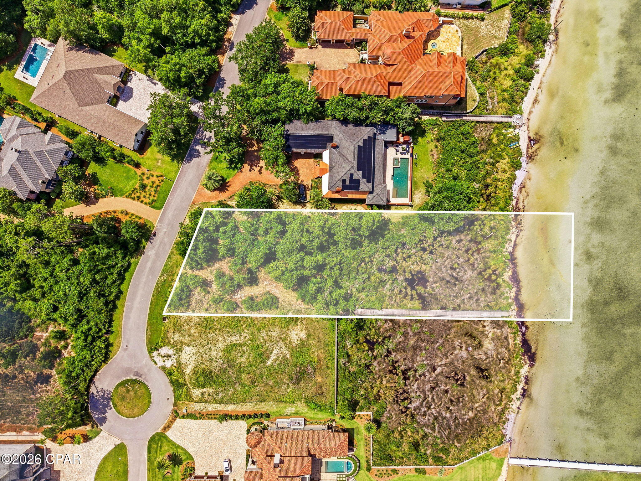 Welcome to 3536 Preserve Boulevard, an exceptional waterfront homesite tucked inside the exclusive gated community of The Preserve in Panama City Beach. Offering an impressive 100 feet of waterfront frontage, this rare lot provides the perfect canvas to design and build your custom dream home while enjoying breathtaking water views and the peaceful privacy this premier neighborhood is known for.
Imagine waking up each morning to stunning sunrises over the water, enjoying serene evenings from your future back porch, and having direct access to the beauty and tranquility of waterfront living. With ample space to create the ultimate coastal retreat, this lot offers endless possibilities for a luxury residence designed to fit your lifestyle.

Located within one of Panama City Beach's most desirable gated communities, The Preserve offers an ideal blend of natural beauty, privacy, and convenience. You'll enjoy a quiet, upscale setting while still being just minutes from the white sandy beaches of the Gulf, world-class dining, shopping, entertainment, and everything Panama City Beach has to offer.

Opportunities like this are hard to find -- 100 feet of pristine waterfront in a gated community, ready for your vision to come to life. Build the dream home you've always imagined at 3536 Preserve Boulevard and experience the very best of coastal waterfront living.