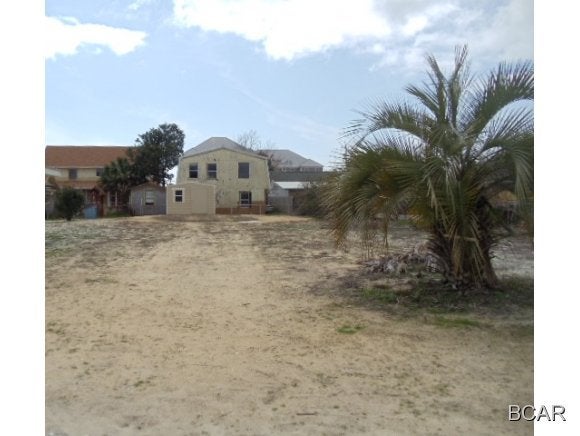 This is a nice large 50x125 lot only 2 blocks to beach Access. This is a great building lot with possible Gulf Views. Building set backs are 20ft from the front 5 ft from each side 10 ft from the back. Height restrictions 45 feet high. Awesome opportunity.