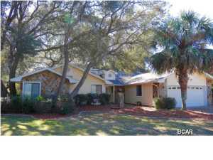 Beautifully landscaped yard with great trees that shade the front and back yard. Sit in your Florida room and enjoy watching the golfers play at a World Famous Meadows Golf Course. This HomePath home features granite counter tops in the eat in kitchen, stove, dishwasher and microwave. There is a separate formal dining room, and large great room. There is tile in foyer, hall and kitchen. Large Master with sitting area, A Florida room that is heated and cooled( sq. ft is not reflected in tax records). Just open the sliding doors to the great room, kitchen and master and you have expanded your living space. Great home for entertaining. Private, deepwater marina is just around the corner and you can be on the Bay, Intra Coastal or Gulf within minutes. Bay Point is a gated community