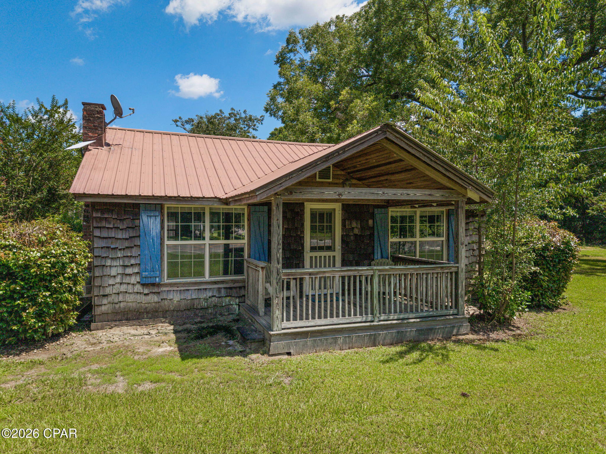 Country charm, ready for your personal touch! This charming one-bedroom, one-bath home is full of character and ready for its next chapter. With a little TLC, this property offers a great opportunity for a first-time buyer, investor, weekend getaway, or anyone looking for a peaceful place to call home. Inside, you'll find a spacious living area with vaulted ceilings and fireplace, open kitchen featuring new butcher block countertops and plenty of cabinet space, and a generously sized bedroom. Step outside to enjoy the screened back porch, where you can relax and take in the peaceful surroundings. The covered front porch adds even more outdoor living space, while the fenced backyard is perfect for pets or gardening. The acre provides plenty of room to expand, add a workshop, or simply enjoy the privacy and open space. If you've been searching for an affordable property with potential in a quiet country setting, this is one you won't want to miss. Schedule your private showing today!