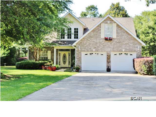 Age, SF, and dimensions approximate. Like new brick home built in 2005.