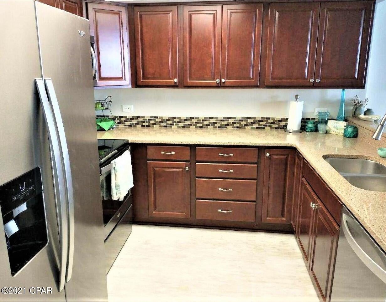 This is your chance to own a spectacular slice of waterfront Paradise at Lagoon Towers, Bay Point. Enjoy commanding 6th floor views of  St. Andrews inlet, State Park, and Shell Island from your living room, bedroom and covered terrace. Watch the parade of boats as they round deep water point and pass directly in front of your spacious balcony while you relax with your morning coffee or afternoon cocktails. Post Hurricane Repairs include a complete new roofing system and exterior elastomeric paint. Inside this tasteful remodeled unit you will find LVP and tile throughout. Stainless Kitchen appliances and new washer/dryer were installed in 2018. HVAC was installed in 2015, and the entire unit was replumed with PEX and a new water heater was installed in 2013. Come and enjoy the high-life at Lagoon Towers, Bay Point, on Grand Lagoon.