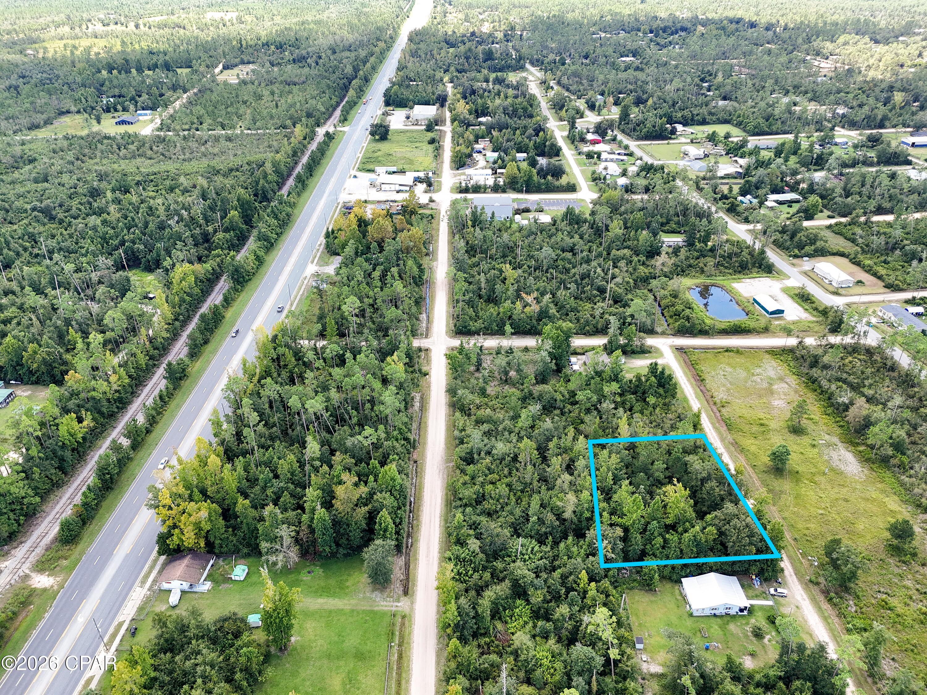 This ~0.62-acre parcel (200'x135') offers a wonderful opportunity to own a piece of peaceful North Bay County. Situated in Fountain, FL, this property provides the perfect blend of quiet rural living while staying within an easy drive to Panama City, local military bases, and the beautiful Emerald Coast beaches. Whether you are looking to build a primary residence, place a manufactured home, use for a small business, or hold for long-term investment, this lot delivers versatility and freedom from city congestion. C3 General Commercial zoning within the Fountain Rural Community Special Treatment Zone offers high potential for a variety of residential and commercial uses. Conveniently located 2 blocks from Highway 231, making commutes to Panama City, Marianna, or local schools straightforward. Parcel 01556-000-000 is behind this parcel and available to purchase, giving access by Lazy Lane as well. 
Don't miss out on an affordable land option in fast-growing Bay County! Contact us today for more details or to make an offer.