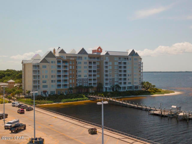 Bay Front Condominium in Historic St. Andrews.  This 2 bed 2 bath unit overlooks the bay and has a balcony patio to enjoy the beautiful sunsets.  Harbour Village is gated for security, has a covered parking garage, community room, fitness room, private park, pool, kayak launch, and marina.  There is a new roof and new AC.  The property has ongoing Hurricane Michael repairs on the exterior to include painting and pool resurfacing.  The pool is currently closed during this time.  Rent includes garbage collection, basic cable, telephone, internet and pest control.  No pets are allowed per HOA guidelines.  All tenants must complete a lease addendum and credit check by the HOA to be approved ($50 application fee).  There are many restaurants and boutiques to enjoy all in walking distance. Washer and Dryer are included.