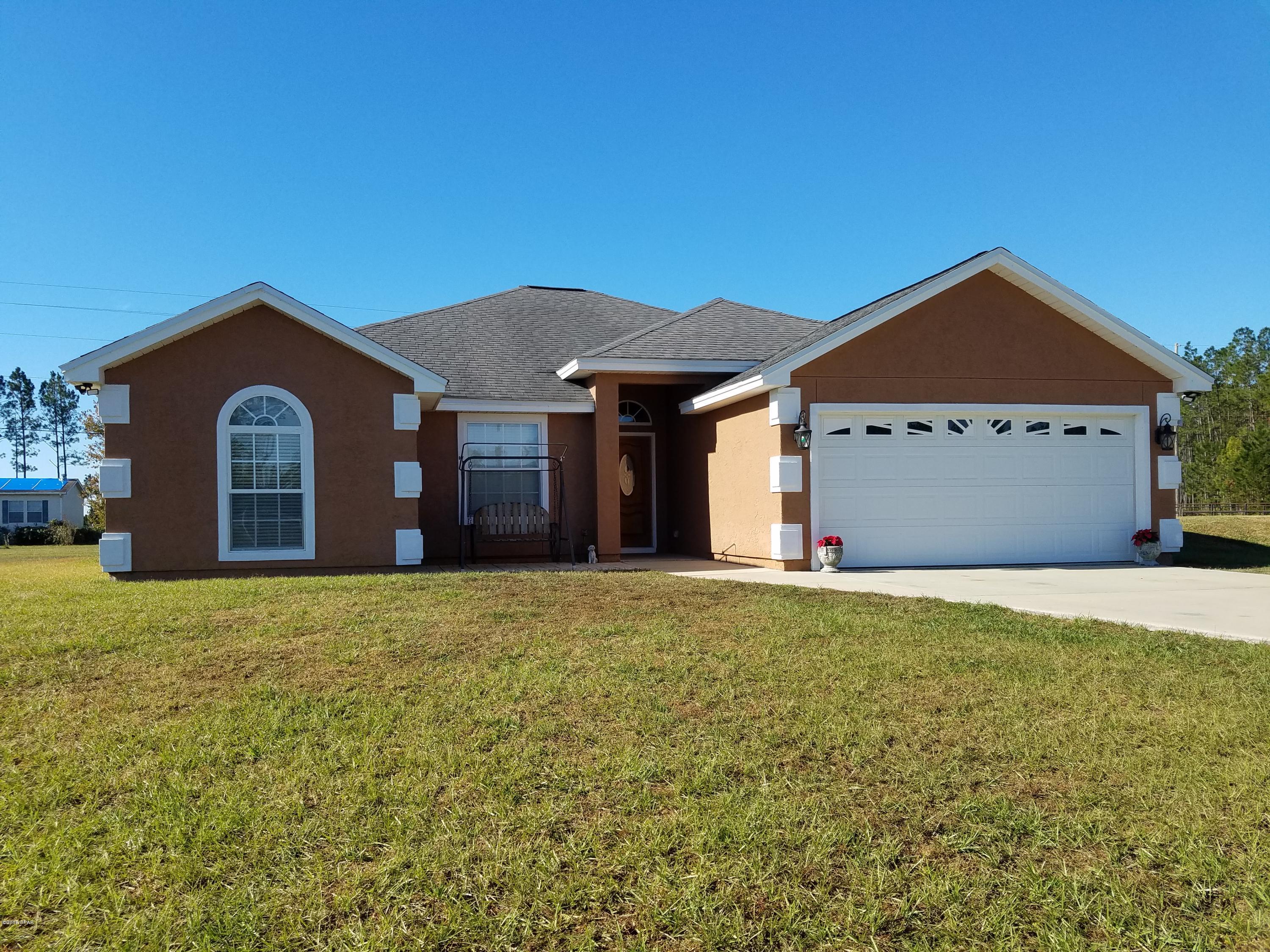 New on the market!  Bring your horses! 11 acre Horse Ranch with Beautiful  2006 Custom built 4/2. Motivated Sellers, have 

already purchased new home. Peaceful and quiet with amazing proximity. Only 15 minutes to Pier Park and Panama City Beach, and just 16 minutes to the airport. Enter into 10ft treyed ceilings and double crown molding. Custom stained concrete floors throughout. Open concept flooplan with dining space and eat-in kitchen. Custom wood cabinets with built-in pantry, island and stainless steel appliance package. Spacious master suite offering double vanities, his and her closets, Jacuzzi tub and shower. All guest rooms are nice sized. 27x15 screened in porch overlooking a pond on the property. 60x50 Pole Barn in 2018. 40x36 horse barn in 2013. 3 pastures 1 acre, 2 acre, and 3 acre. Owners currently have 6 horses on the property.New AC in 2015, New well in 2017. Owners have maintained this home with an open checkbook. Home had zero damage during Hurricane Michael. Sellers are only selling because they have purchased a home with additional acreage. Ready for your Horses. Water to the pastures and all shelters less than 5 years old. Ram Fencing. Property backs up to plenty of riding trails that take you to intracoastal waterway and the sand dunes. Home and Barn under a termite bond with Ensec. This home is very unique and priced to sell.