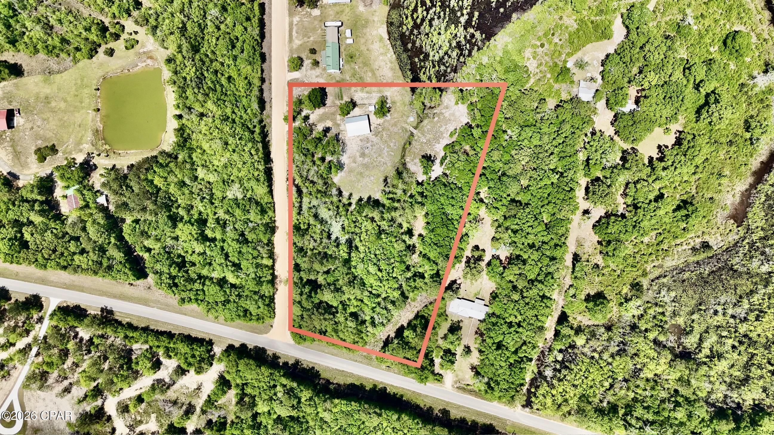 Discover the potential of this 6.07-acre property offering space, functionality, and versatility. The property features a large pole barn approximately 24x48 with an attached 14x48 lean-to, ideal for equipment storage, a workshop, or potential barndominium conversion. A small storage shed is also included.

A septic tank is already in place, providing a great starting point for your future homesite, mini farm, or weekend retreat.

Conveniently located approximately one hour from Panama City Beach, FL, and about 45 minutes from Ft. Rucker, this property offers peaceful country living with easy access to nearby amenities.

Camper may be purchased separately. Contact your agent for additional details and to schedule a showing.

Buyer and buyer's agent to verify all information deemed important.