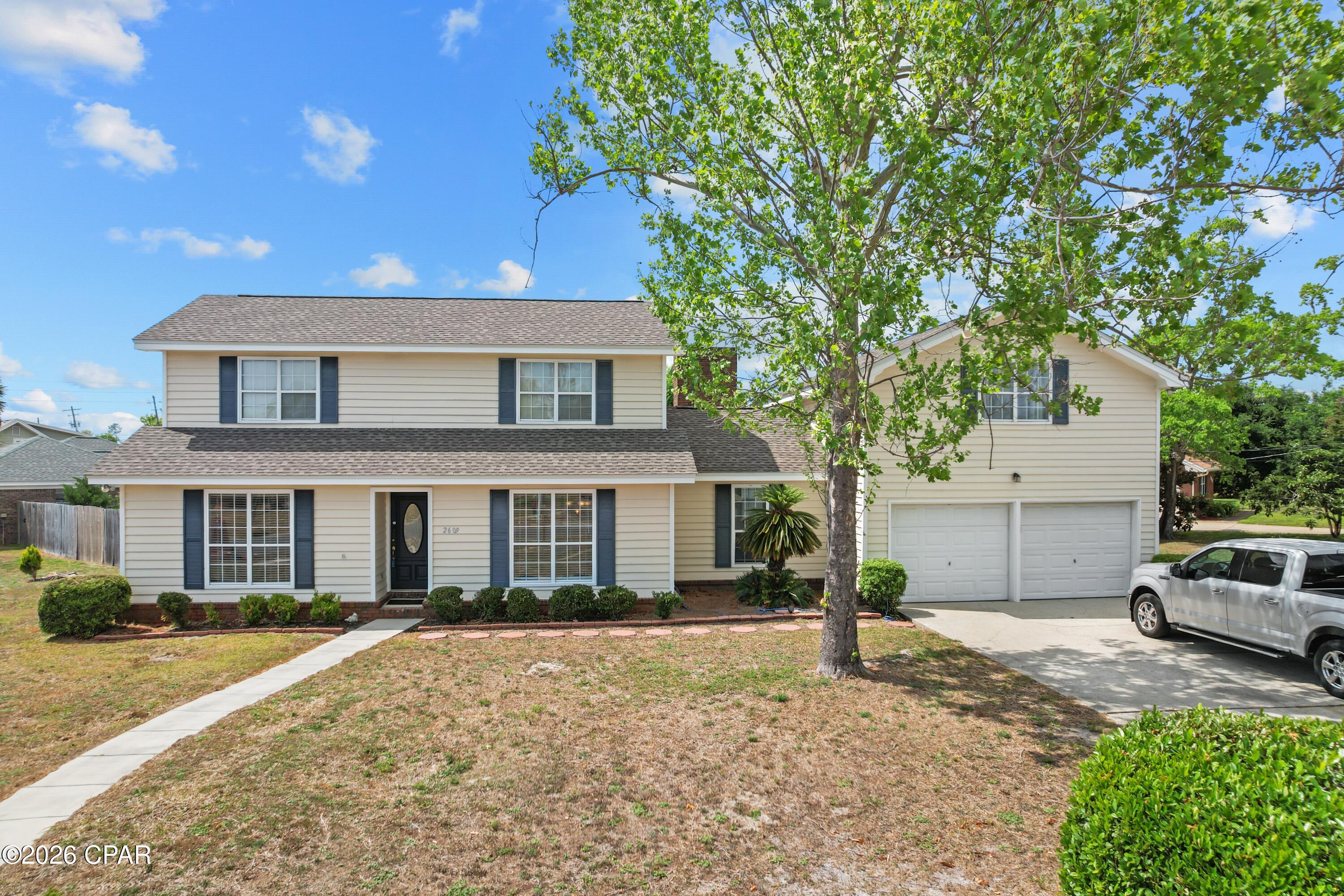 This 4 bedroom 3 bath home is a gathering place for friends and family which is nestled in Panama City's popular Forest Park area.  Home offers 2 MASTER SUITES one on each floor making it perfect for a family with a parent living with you, teenage children or if you have frequent house guests.  Cozy family room with a beautiful fireplace, and vaulted ceilings, spacious living and dining room, either which could be used as a home office.  Kitchen has stainless appliances, plenty of cabinet and counter space, granite counter tops, a cozy breakfast nook overlooking the large back yard.  Recent upgrades include but are not limited to replacing AC/Heating unit, privacy fence, exterior and interior painted, LVP flooring and the pool was refinished.  In the spacious back yard you will find a wonderful inground pool and firepit which can be enjoyed while sitting under the covered patio.   Home has been meticulously maintained as you will notice as you enter the front door.  Call for your private showing today.   All sizes, ages are approx. measure if important.