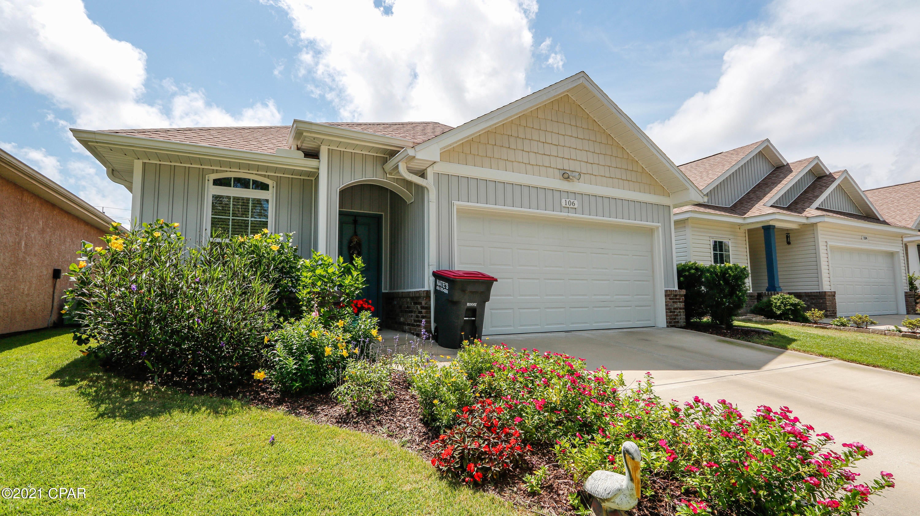CURRENTLY UNDER CONTRACT, SELLER ACCEPTING BACK-UP OFFERS - This quality built Home shows like new. Immaculate home with a double car garage located a mile away from the beautiful white sands of the central area of Panama City Beach, located on the south side of Panama City Beach Parkway. Close to Hutchison Beach Elementary School and Surfside Middle School as well as Arnold High School. All within 2 mile radius. This single family home has high ceilings with lots of counterspace and cabinets.  Open floorplan from kitchen bar into living room. Master Bath has soaking garden tub and separate shower. Backyard is totally fenced with a screened in porch and separate deck.  Homeowner takes pride in the landscaping and it shows.  No vacation rentals allowed.