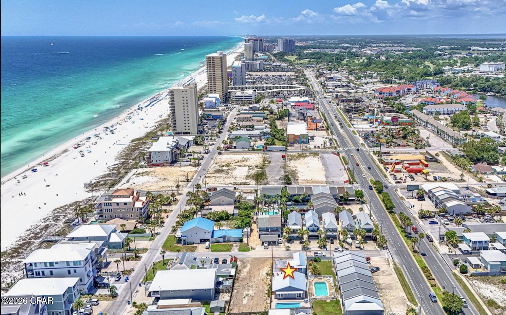 Rare PCB Beach Compound 4109&4111 Marlin St|| 3 Residences • One Parcel • Two Lots from the Beach • Heated/Chilled Pool • Sleeps 18-20 • Fully Furnished & Turnkey. with effective build date June 2026

Rare opportunities like this simply don't exist anymore. Just two lots from the beach, this one-of-a-kind Panama City Beach compound offers three separate residences on one parcel--a beautifully rebuilt two-story duplex with two 2-bedroom, 1-bath residences and a stunning 3-bedroom, 2-bath main home centered around a private resort-style heated and chilled pool. Combining location, flexibility, and the quality of new construction, this is a truly rare opportunity in one of Panama City Beach's most desirable vacation rental corridors.

Professionally reconstructed and completed in June 2026, this is far more than a renovation. Thoughtfully rebuilt by the owner--not a builder flip--the property was designed specifically for luxury vacation rentals with an emphasis on quality, longevity, energy efficiency, and exceptional guest experience. Every detail was intentional, from the 10-foot ceilings in the main home and custom 8-foot hurricane-rated doors to the impact-rated windows and doors, custom transom windows, smart LB siding, designer coastal finishes, custom-built bunk rooms, and durable low-maintenance materials throughout.

Designed to comfortably accommodate 18-20 guests, the compound is ideal for large family vacations, multi-generational gatherings, corporate retreats, or premium vacation rental operations. The resort-style outdoor living area features a new heated and chilled swimming pool, two grilling stations, expansive paver decking, and a hot and cold outdoor shower, creating an exceptional space for relaxing and entertaining after a day at the beach.

Operational efficiency was equally important. Each residence has its own electric meter, each building has its own water meter, and the property includes a dedicated owner's closet, making ownership and management simple and efficient. Six off-street parking spaces provide ample room for owners and guests.

Located in the highly sought-after Lower Grand Lagoon area, you're just a short walk from the beach and minutes from St. Andrews State Park, Shell Island excursions, marinas, waterfront dining, shopping, and entertainment. Leave the car behind and enjoy one of the most walkable and desirable beach locations on Panama City Beach.

Situated in Flood Zone X no flood insurance needed and offered fully furnished and completely turnkey, this exceptional property is ready for immediate personal enjoyment or income-producing vacation rental operation from day one.

Properties offering three fully rebuilt residences on one parcel this close to the beach are exceptionally rare and increasingly difficult to replicate. Built to be owned--not flipped--this extraordinary beach compound reflects thoughtful planning, premium materials, and craftsmanship rarely found in today's investment properties.