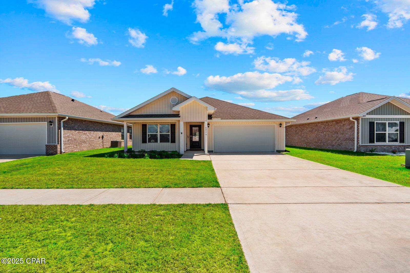 Welcome home to 6416 Slabinski Lane, a beautifully maintained 4-bedroom, 2-bath home located in the desirable Liberty community of Panama City!

This spacious home features an open-concept floor plan designed for comfortable everyday living and entertaining. The kitchen offers stainless-steel appliances, a large island with bar seating, and plenty of cabinet space, creating a functional space for both cooking and gathering.

The spacious primary suite provides a relaxing retreat with a soaking tub, separate shower, double vanity, and walk-in closet. Three additional bedrooms offer plenty of flexibility for family, guests, a home office, or hobbies.

Enjoy Florida living from the covered back patio and privacy-fenced backyard, perfect for relaxing outdoors or entertaining.

Enjoy All That Liberty Has to Offer!

Living at 6416 Slabinski Lane means more than just having a beautiful home -- residents also have access to an impressive collection of community amenities, including:

* Two community swimming pools
* Splash pad
* Basketball court
* Pickleball courts
* Two playgrounds
* Fitness center
* Wellness and yoga spaces
* Outdoor grilling and kitchen areas
* 7,500-square-foot amenity center/clubhouse
* Community gathering and event spaces
* Sidewalks throughout the community
* Ponds, fountains and conservation areas

Conveniently located off Highway 231 and Star Avenue, Liberty provides easy access to shopping, restaurants, schools, medical facilities, Tyndall Air Force Base and everything the Panama City area has to offer.