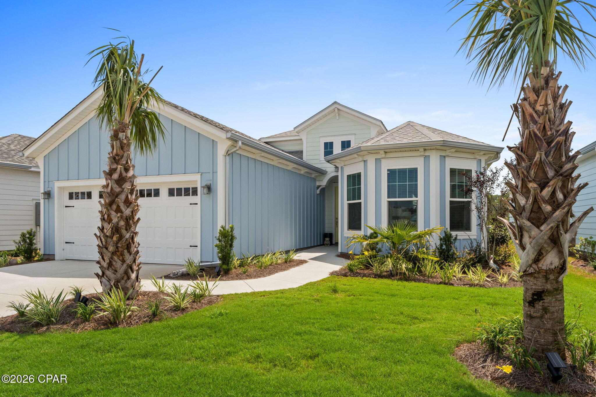 Rare opportunity to own a highly upgraded Parrot floor plan on a premium, hard-to-find pond and preserve-view homesite in sought-after Phase 7 of Latitude Margaritaville Watersound! This beautiful PARROT- Beach Collection home offers 3 bedrooms, 2 baths plus a den/office/hobby room and is being sold FULLY FURNISHED! No detail was spared in creating this exceptional home, where an open, flowing floor plan, incredible year-round water views and spectacular Florida sunsets set the stage for relaxed coastal living.

A dramatic foyer welcomes you with a custom shiplap feature wall and designer lighting. Continue into the gorgeous kitchen featuring upgraded 42'' soft-close cabinetry, drawer stacks, pull-outs and an impressive built-in pantry surrounded by a wall of cabinetry offering exceptional storage. Quartz countertops, tile backsplash, under-cabinet lighting and upgraded gas appliances complete this beautifully designed space.

The kitchen opens seamlessly to the spacious family room, where a vaulted ceiling with decorative beams, shiplap feature wall and built-in speakers add character and style. A wall of sliding glass doors showcases the breathtaking pond and preserve views and brings the outdoors in. Enjoy watching wildlife by day and unforgettable sunsets in the evening--all from the comfort of your own home.

The spacious primary suite features a beautifully upgraded ensuite bath with an oversized tiled shower, frameless glass enclosure, built-in corner seat, upgraded cabinetry and quartz countertops. Two additional bedrooms provide plenty of room for family and friends, while the conveniently located den/office/hobby room offers flexible space for working from home, hobbies or additional guest accommodations.

The upgrades continue with highly upgraded tile flooring throughout, designer lighting and ceiling fans, custom paint, multiple feature walls, blinds throughout and HURRICANE-IMPACT windows. Step outside to the extended screened lanai with pavers, an ideal spot for morning coffee, entertaining or simply relaxing while taking in the peaceful pond, preserve, wildlife and sunset views.

For additional peace of mind, a whole-house GENERATOR was recently installed at a cost of approximately $12,000. The garage offers attic stairs, coated flooring and mounted overhead storage. Additional conveniences include a laundry sink, laundry cabinetry and so much more.

Home has the remainder of the 2/10 structural warranty and the builders 1 year warranty Master Care extends to Feb. 2027. 

Located in the vibrant 55+ active-adult community of Latitude Margaritaville Watersound, residents enjoy an incredible resort lifestyle with the Paradise Pool, fitness center, pickleball and tennis courts, live entertainment, dining, social clubs, walking and biking trails, golf-cart-friendly streets and an endless calendar of activities.

Even more convenience is coming to the surrounding Watersound area with continued commercial development, shopping, dining and Publix nearby, along with a new hospital under development nearby. And when you're ready for a beach day, the sugar-white sands and emerald waters of the Gulf Coast are approximately 7 miles away.

Premium pond and preserve homesites like this are difficult to find--especially with these views, upgrades and a fully furnished home! This exceptional Parrot combines location, luxury, privacy and the Latitude lifestyle in one beautiful package. A must-see!