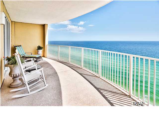 **PRICE REDUCED BELOW RECENT COMPS 8/27/15 - THIS UNIT COMES WITH A DEEDED PARKING SPACE UNDERNEATH! NEW HVAC! NEW HOT WATER HEATER! DEEDED EXTERIOR STORAGE! WHAT A BONUS! GREAT DEAL!!**  Emerald Isle is approximately 3/4 mile west of Highway 79 leading to Northwest Florida Beaches International Airport & just a mile further from shopping & dining at Pier Park. Enjoy incredible views from this beautifully appointed top floor unit on the 23rd floor. The living area & master bedroom access a bowed balcony showcasing panoramic views over the emerald gulf waters. Building amenities include two levels of covered parking, a gulf front pool joined by an additional indoor pool & whirlpool, as well as a fitness center & beach access. Emerald Isle is a great property in the perfect location! the perfect location for a vacation rental investment or simply a place to getaway to a few times a year. Come see it for yourself!