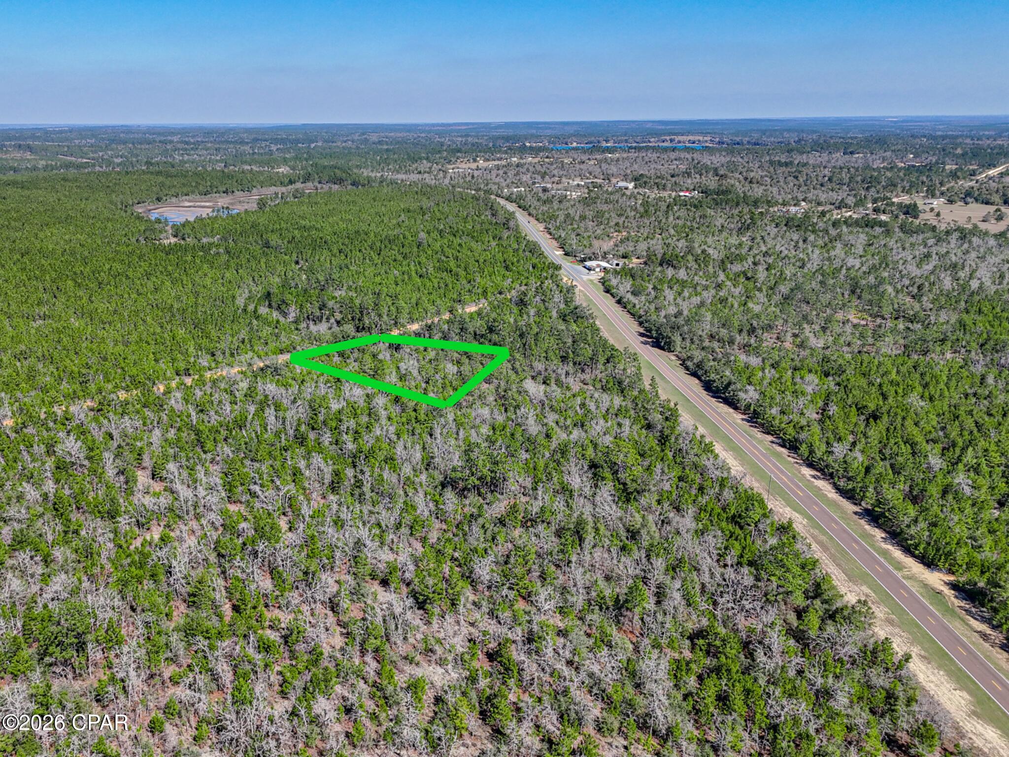 This stunning property is located off CR 167, just 4 miles east of Hwy 231 and is conveniently situated near some of Florida's most beautiful springs. See NWF Water Management website for a list of the springs along the Chipola River Basin as well as Econfina Creek Wildlife Management area. Zoning is AG and allows 1 house per acre. The pristine beaches of the Gulf Coast are approximately 90 miles, Tyndall AFB is about 40 miles, and the Chipola River Picnic Area & Boat Ramp is about 20 miles. The Compass Lake community sits just north of the property and is home to Compass Lake & Silver Lake.   If measurements deemed important, please verify.