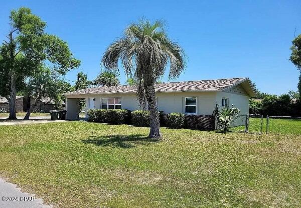 3 bedroom, 2 bath home on large corner lot with chain link fenced backyard with 1 car carport and 2 car driveway. This home was remodeled in 2019 with LVP flooring throughout and features living room, eat-in kitchen, breakfast bar, large bonus room with sliding glass doors to open courtyard, laundry room with built-in bench, washer/dryer hookups and door to carport. 3 exterior storage rooms not climate controlled.
Fireplace is non-operational!