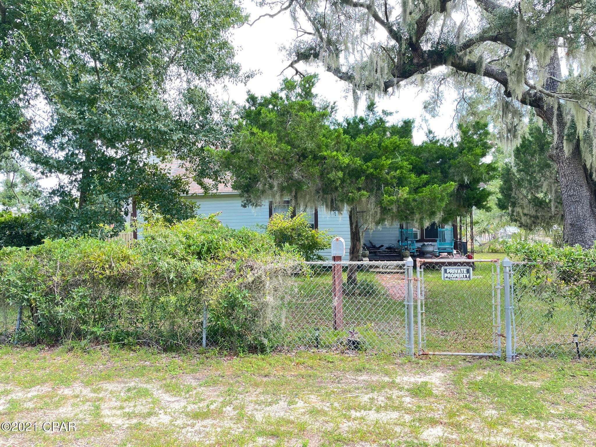 Great location in the St. Andrews area. Just a short distance to the bay and downtown St. Andrews with access to the marina and lots of restaurants and some shopping.  Tree shaded lot on a corner lot is the perfect place to relax and enjoy while making this house just what you need it to be to call home.  Lots of potential so don't delay.  Look at this home and property today.