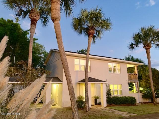 CURRENTLY UNDER CONTRACT. SELLER ACCEPTING BACK UP OFFERS. 1/2 BLOCK TO SANDY WHITE BEACHES in highly sought after WEST END! Seaside lifestyle meets peaceful privacy in this unique custom built coastal home. Nestled among LUSH LANDSCAPING with PRIVATE GARDEN, spacious decks and large back yard all on a 75' x 120' OVERSIZED LOT. This home has been TOTALLY RENOVATED and exudes a coastal charm that says ''Relax and Enjoy''. The soothing color palette, ship lap walls and custom draperies reflect a true designers touch and inviting warmth throughout. WALLS OF WINDOWS wrap the main living/dining area providing a light and airy invitation to the spacious outdoor areas. The fully equipped UPGRADED KITCHEN is one any chef will love, and the master bedroom boast a wall of windows and a bath with WALK IN SHOWER