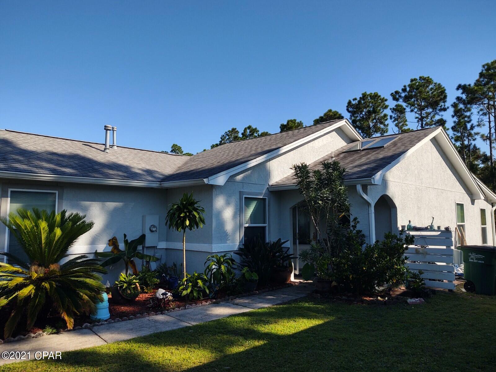 CURRENTLY UNDER CONTRACT, SELLER ACCEPTING BACKUP OFFERS. Wonderful 2 Bed 2 bath Home with a large deck and water view! This home is 2 Bedrooms / 2 Bathrooms with a Bonus Enclosed Florida Room that opens out to the deck. The Florida Room is both heated and cooled and could be converted to a Third Bedroom by adding a Closet. Home has been updated with all New Windows, New Skylights in the Kitchen and the HVAC & Hot Water Heater are only a few years old. Gas Log Fireplace in the Living Area for the Family to Enjoy! You can also enjoy the Great Sunset Views over the Canal from the Large Roomy Deck or If you prefer, you can try your hand at catching some Bass or Brim. This Home also features and Two Car Attached Garage. It's Located in the Gated Community of Harbour Towne which features:  : 2 Pools, Tennis Court, Community Center and is also Centrally located the Navy Base, St. Andrews State Park, and the Beaches!!! Don't miss your chance to make this Great Home Yours! All Dimensions are Approximate and should be verified if Deemed Important.
