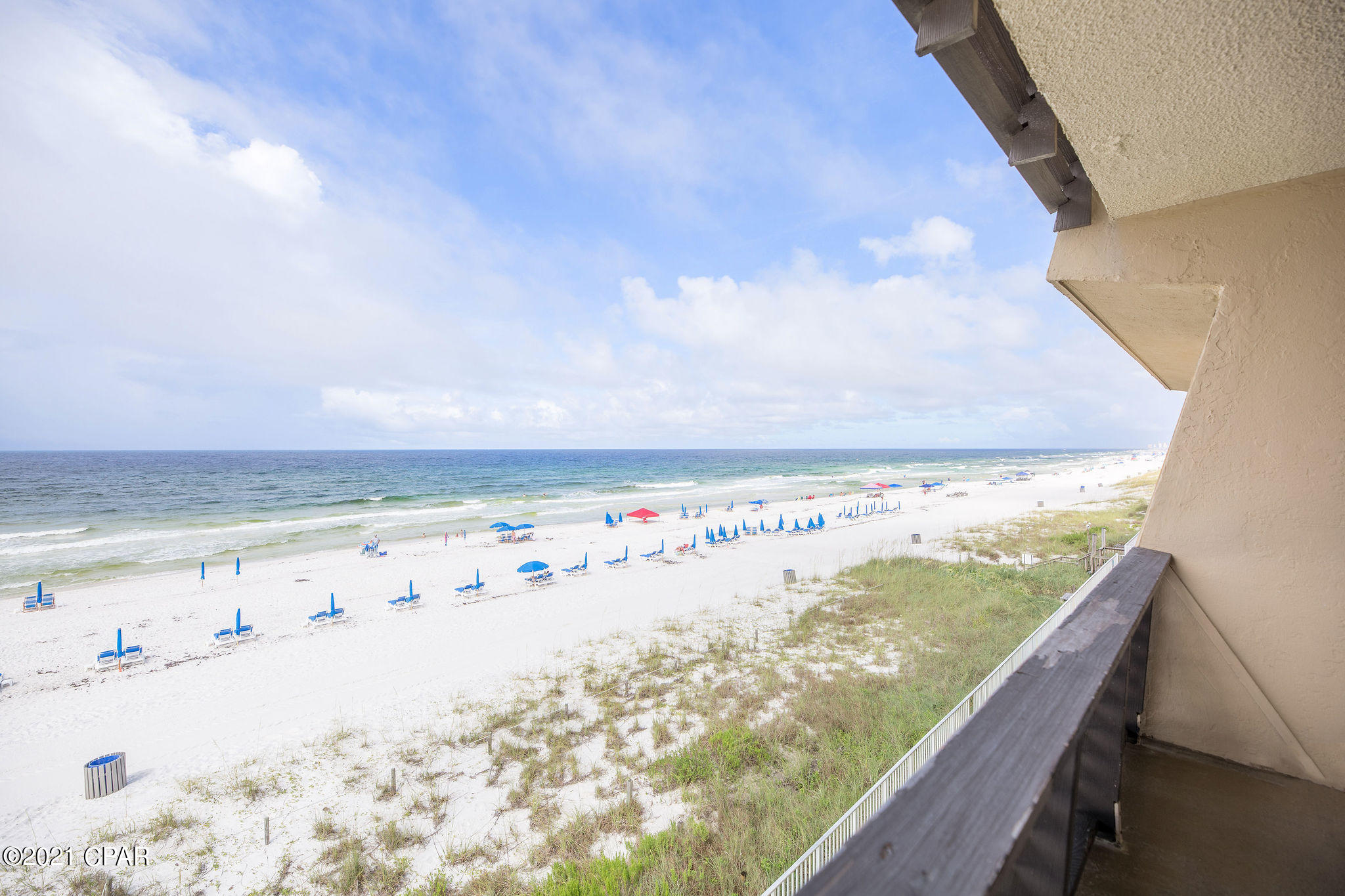 Seller is motivated, bring your offers! A low-rise, Panama City Beach original, this 3 bedroom 2 bathroom unit in Gulfgate is ready for your updates! Gulfgate units rarely come up for sale (there has not been a 3 bedroom for sale in 3 years) so do not miss out on this one. Just under 1,500 sq. ft of space directly on the World's Most Beautiful Beaches, this unit boasts a large Gulf front master bedroom and two additional bedrooms toward the back of the unit for a split floor plan feel. Each bedroom is large and could fit king beds or multiple bunk beds to maximize sleeping space. No waiting for elevators as this unit is just one flight of stairs above ground level. Covered pool on bottom level allows for lounging and swimming rain or shine! Gulfgate is a low density complex with no large developments around it equalling quieter, less crowded beaches, and ease of movement around the area. Close to local attractions and locally owned restaurants, Gulfgate is the perfect building for a lucrative vacation rental or a 2nd beach home!