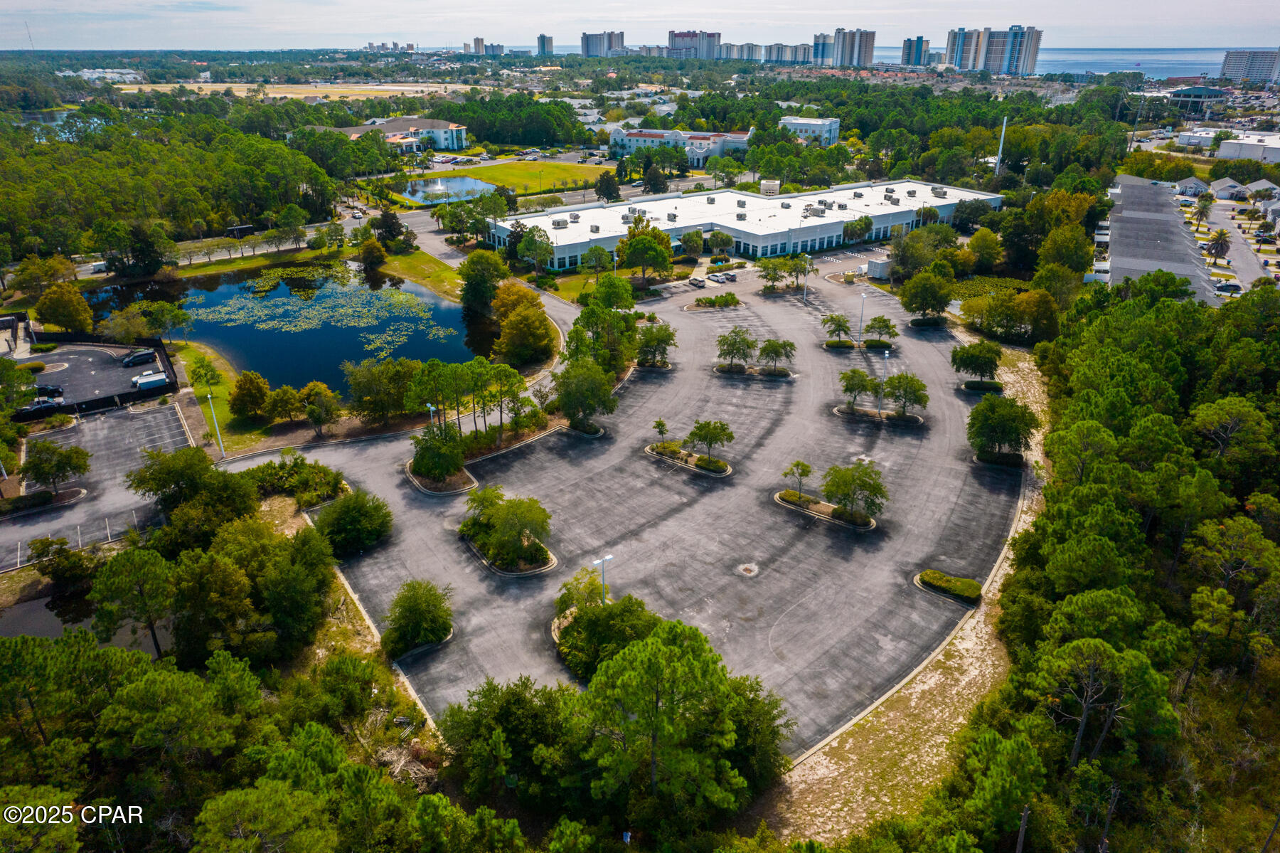 Five Bridges Real Estate Services is pleased to present the 67,415 +/- SF Class A Office at 200 Richard Jackson Blvd. in Panama City Beach, available for Lease or Sale. The entire 67,415 +/- SF building is available for occupancy and can be divided, providing space options from 13,000 +/- SF to 67,415 +/- SF The Class A office building is a former call center and has 450+, including a reception/lobby area, 2 conference rooms, ample storage space, a mailroom, (4) four private offices, 6,000+/-SF empty space perfect for custom buildout, Late-night key card entry, ample parking, and signage with high visibility.