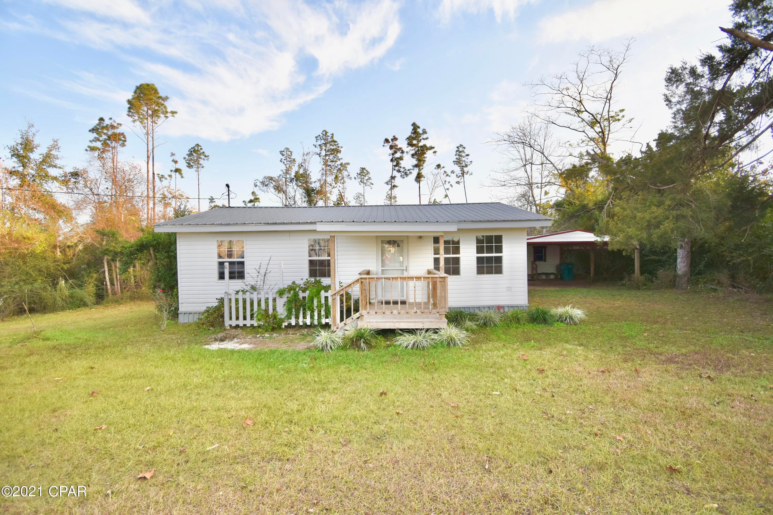 CURRENTLY UNDER CONTRACT, SELLER ACCEPTING BACKUP OFFERS  

Cute vinyl sided house located down a quiet street just inside the city limits of Alford. This home features two bedrooms and two bathrooms with a large Florida room/utility area. This room could serve as another bedroom if necessary! In 2009 an addition was put on and the original structure was gutted and remodeled including: new wiring, plumbing, roof, AC + duct work, water heater, appliances, drywall, flooring, etc. Off the front is a covered porch and another open porch on the back. There is a 12x24 storage shed with an attached carport to the right of the home. This home is move in ready and ready for its new owners! Sq. footage is approximate. Home is being sold as-is