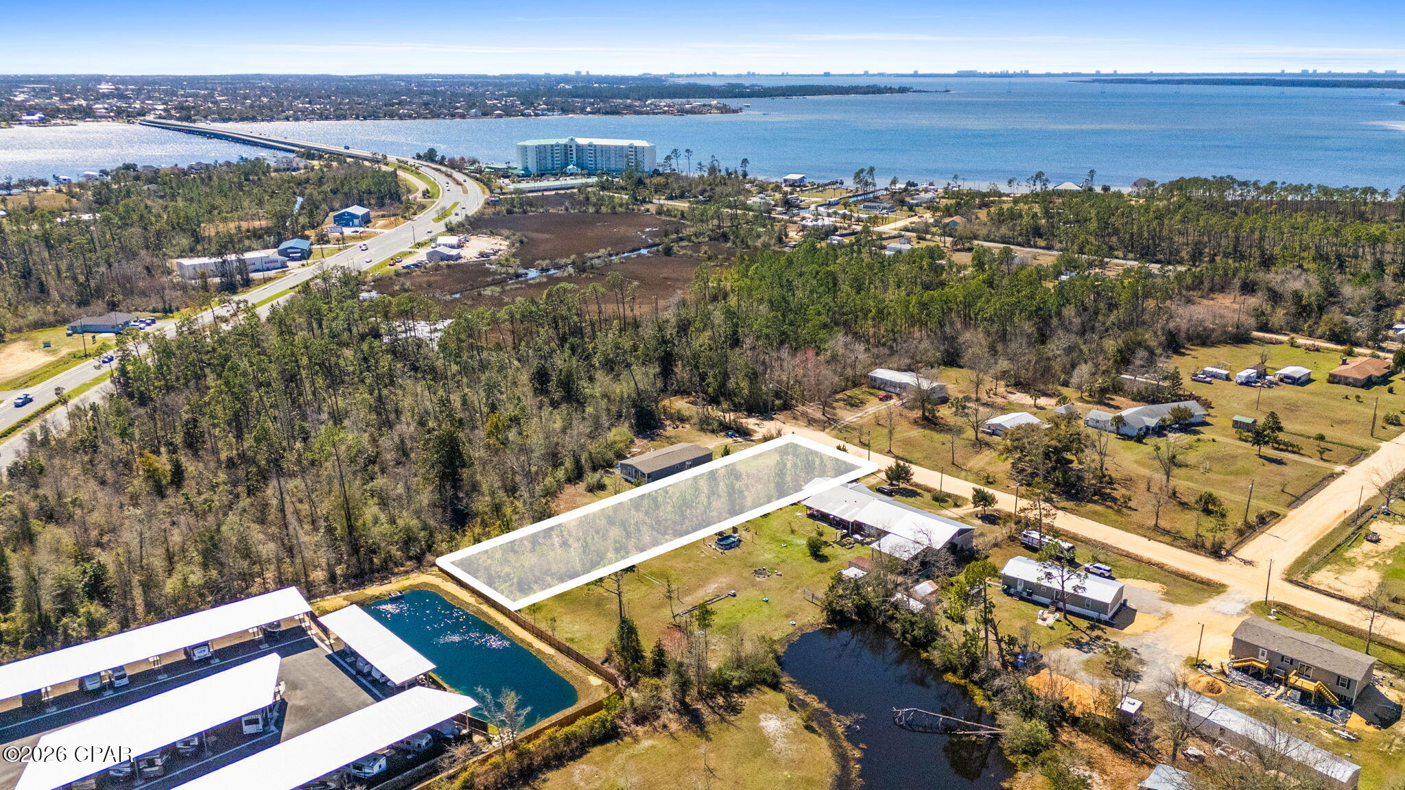 If you've been searching for a homesite that offers both space and convenience, this parcel on Tillman Rd presents a unique opportunity. Featuring a long, wooded footprint surrounded by established homesites, the property provides a peaceful setting with flexibility to design your future residence or investment project (buyer to verify permitted uses).

Ideally located just minutes from North Bay and the Hwy 77 corridor, the property offers convenient access to Lynn Haven, Panama City, shopping, dining, and everyday amenities while maintaining a quiet residential feel. The surrounding area continues to attract buyers seeking space, accessibility, and proximity to the water without the density of more urban neighborhoods.

Buyer to perform all due diligence regarding utilities, zoning, land use, access, environmental conditions, and property suitability for intended use.