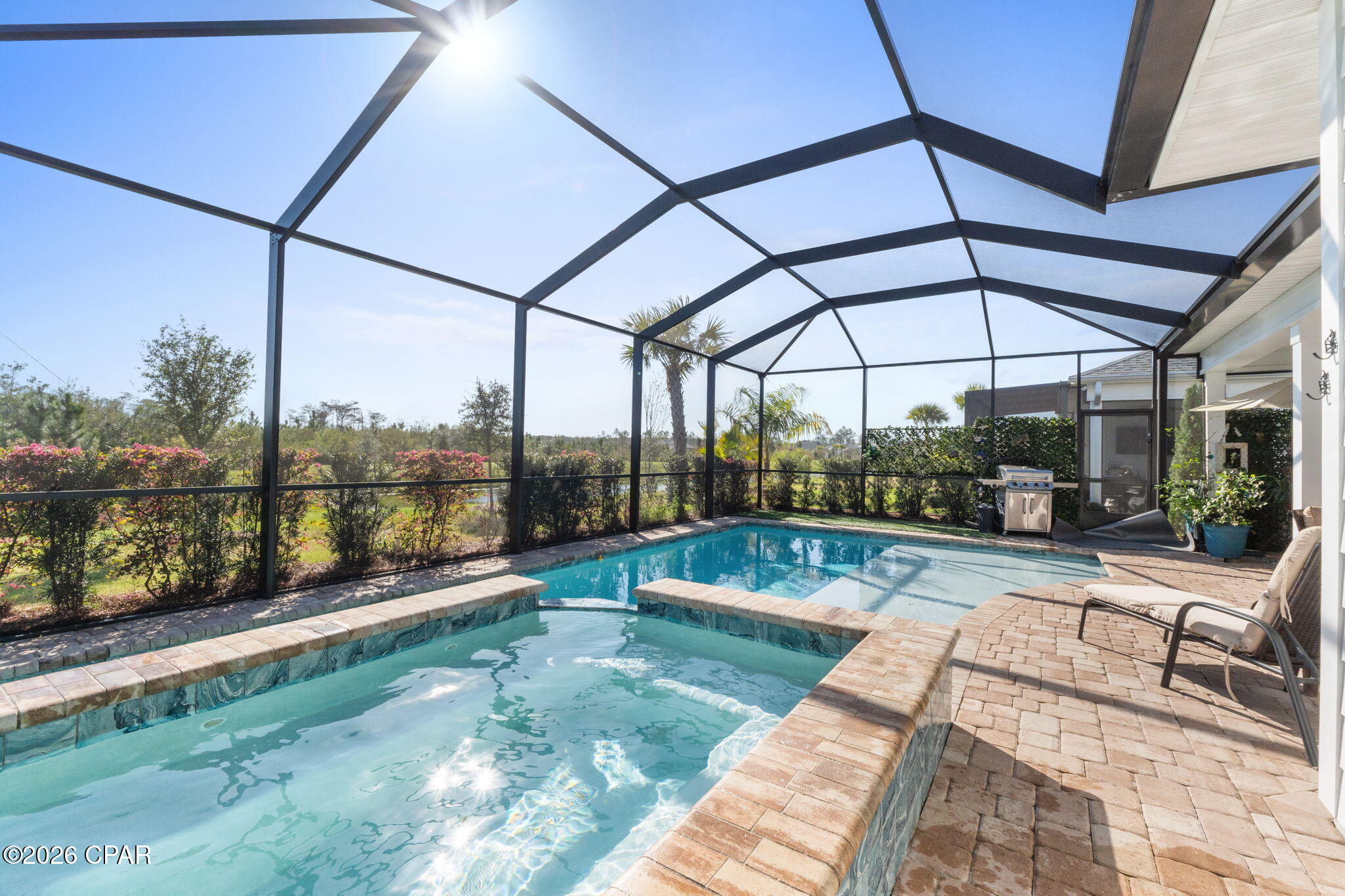 ****SIGNIFICANT PRICE REDUCTION****MOTIVATED SELLER! BRING ALL OFFERS!****

Welcome to your own slice of paradise in Latitude Margaritaville Watersound! Located in highly sought-after Phase 3, this beautifully upgraded Breeze Bay is ideally situated near Town Square and the community's world-class amenities.

Step inside to a bright, open living area featuring architectural ceiling beams and a cozy fireplace--an inviting space for entertaining friends or unwinding after a day in the Florida sunshine. The chef-inspired kitchen is equipped with a gas range, oven, and microwave, while the stunning Mother-of-Pearl half bath adds an unforgettable touch of coastal elegance.

The spacious primary suite offers a private door leading directly to the lanai and pool area. Its spa-like bathroom features a zero-entry shower, custom backlit mirror with an integrated medicine cabinet, and an additional linen tower for convenient storage. At the front of the home, a light-filled room with a sunny bay window provides wonderful flexibility as a third bedroom, home office, or peaceful retreat.

Step outside and experience the Florida lifestyle at its best. The saltwater pool and spa feature a generous tanning shelf and overlook tranquil preserve and pond views--the perfect setting for relaxing, entertaining, or enjoying a refreshing drink as the sun goes down.

Thoughtful finishing touches include a laundry-room sink, washer and dryer with an extended warranty, and an epoxy-coated garage floor.

Life in Latitude Margaritaville Watersound centers around the vibrant Town Square, where neighbors gather, live music fills the air, and every day feels like a celebration. Your island-inspired lifestyle is waiting!

All indoor and outdoor furniture is negotiable, with the exception of the piano.
