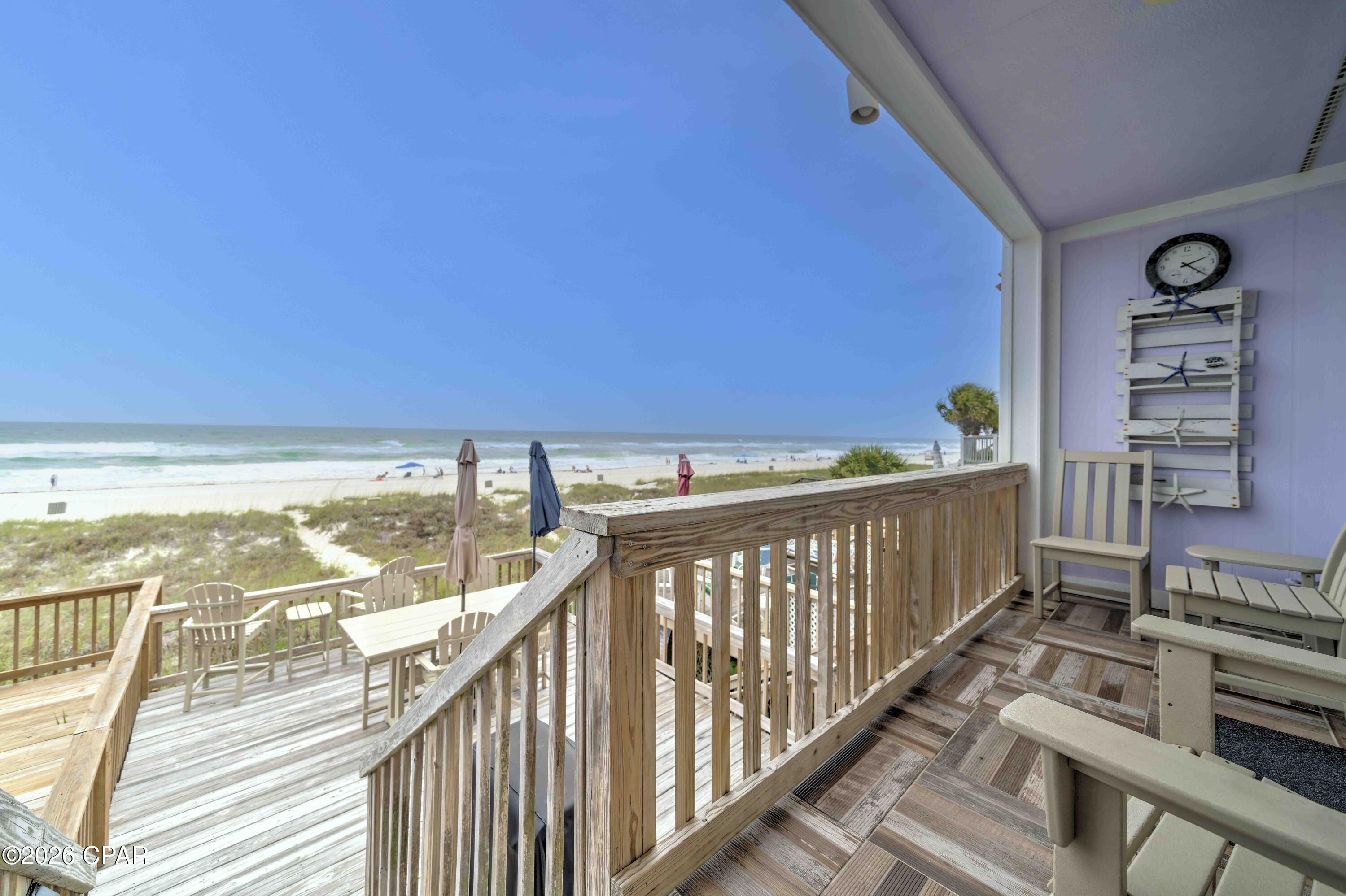 CURRENTLY UNDER CONTRACT, SELLER WILL CONSIDER BACKUP OFFERS  PRICE IMPROVEMENT!!!! Experience GULF-FRONT LIVING at its finest in this fully furnished, short-term rental-ready townhome located directly on the sugar-white sands of Panama City Beach. With NO HOA, this property offers a rare combination of investment potential, flexibility, and beachfront enjoyment.

Thoughtfully updated and meticulously maintained, this coastal retreat features upgraded Anderson windows and Pella sliding glass doors, Hardie Board siding, a new roof (2025), updated HVAC, replaced plumbing, renovated bathrooms, and a stunning kitchen remodel completed in 2024 with new cabinetry, countertops, appliances, and lighting. The spacious interior is tastefully furnished and equipped with everything needed to continue operating as a successful vacation rental or to enjoy as a personal beachfront getaway.

Step outside to enjoy the Gulf views from the updated deck and outdoor living spaces, perfect for entertaining or relaxing after a day at the beach. Additional features include keyless entry, an owner's closet, electric vehicle charger, updated washer and dryer, upgraded insulation, and numerous other improvements that provide peace of mind for years to come.

Whether you're looking for a turnkey investment property, second home, or full-time beachfront residence, this Gulf-front gem offers the opportunity to own a piece of paradise with no HOA restrictions and direct access to one of Florida's most beautiful beaches!!!!!!! Call your Favorite Realtor to see this one!! Buyer to verify all measurements.